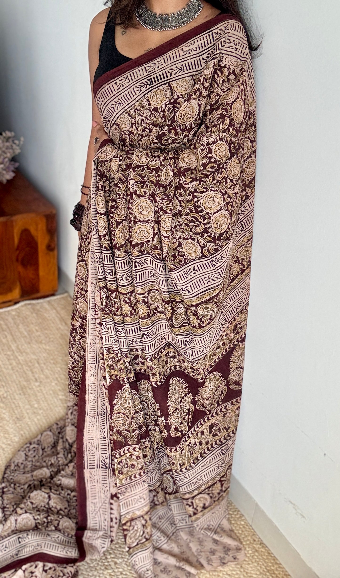 Dark maroon kalamkari, yellow floral vines, floral motif pallu