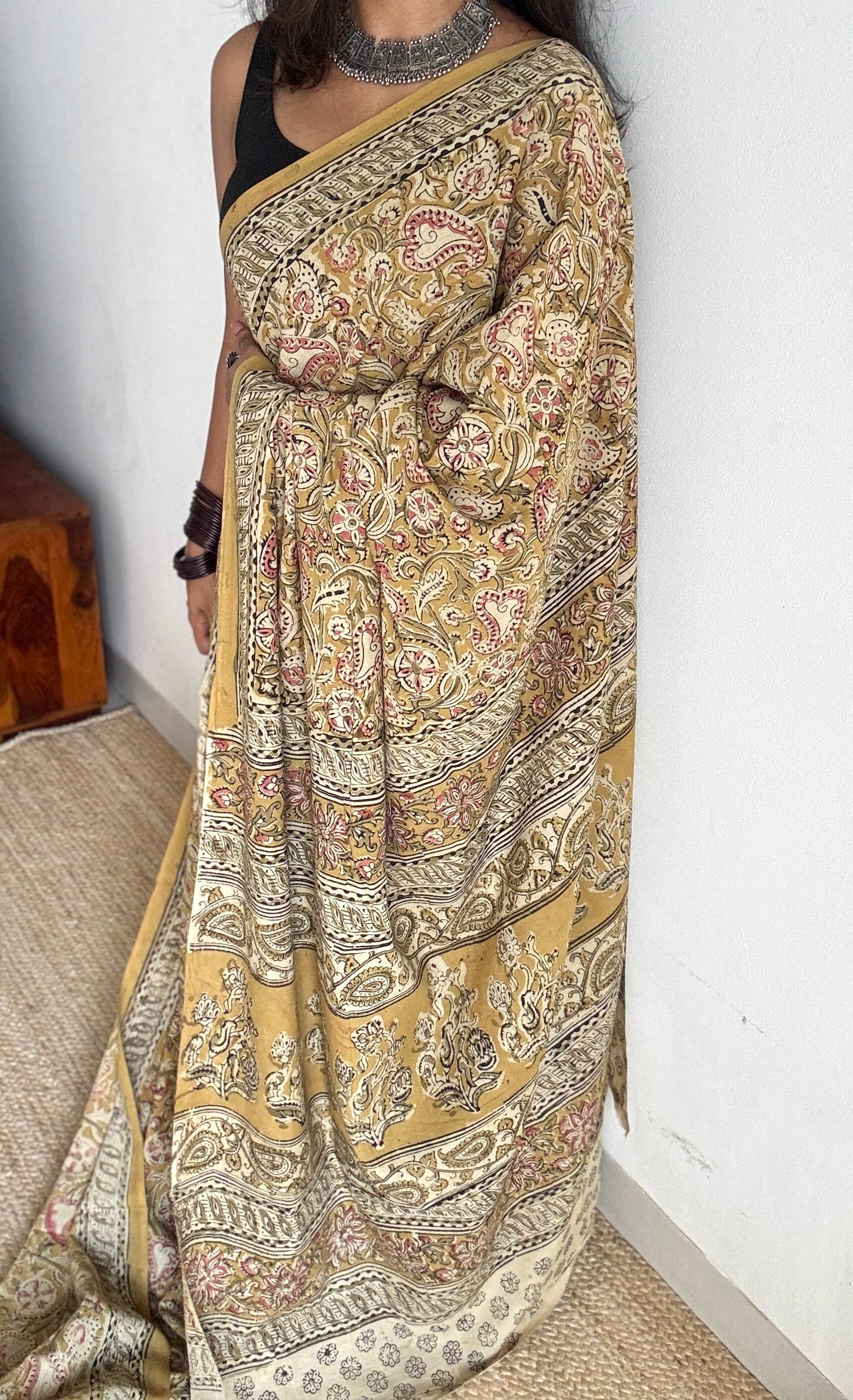 Ginger yellow kalamkari, pink floral vines, floral motif pallu
