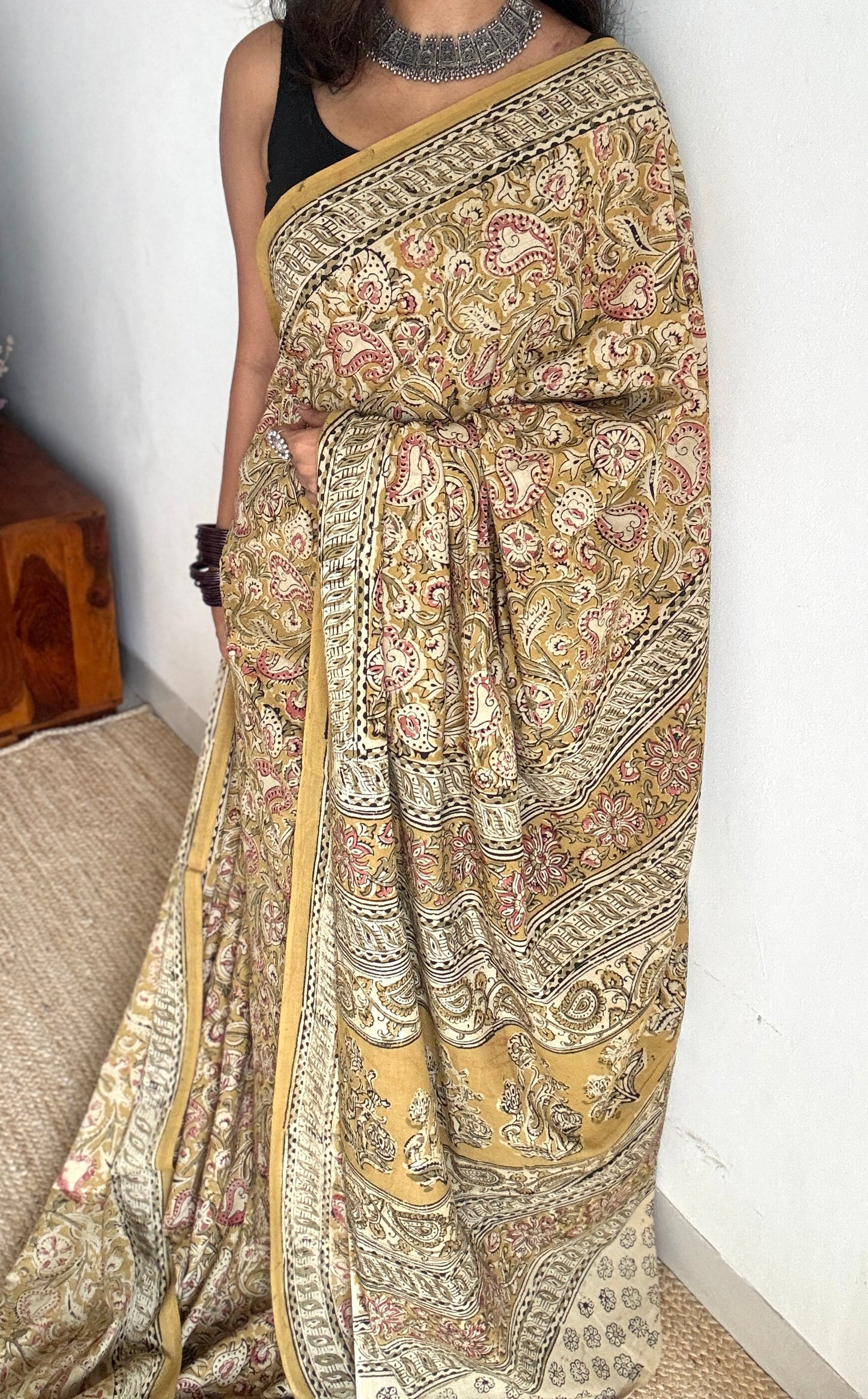 Ginger yellow kalamkari, pink floral vines, floral motif pallu