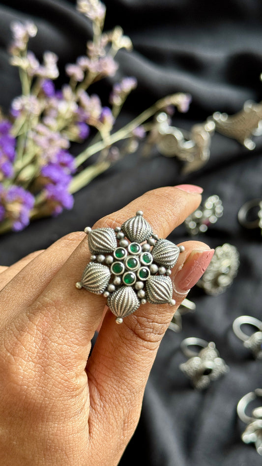 Adjustable floral petal ring - green stones