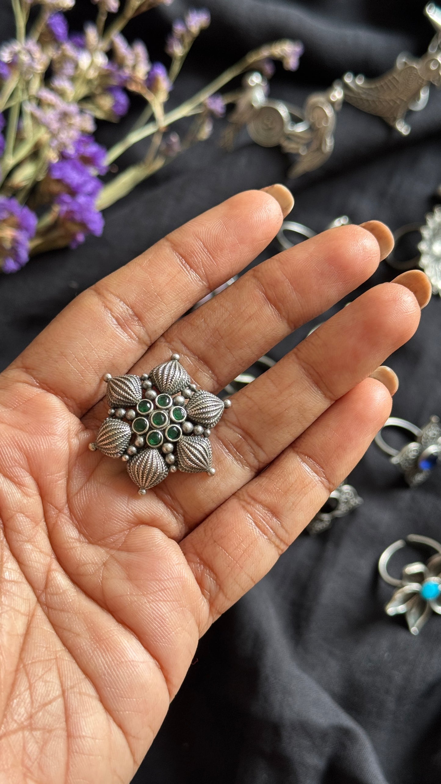 Adjustable floral petal ring - green stones