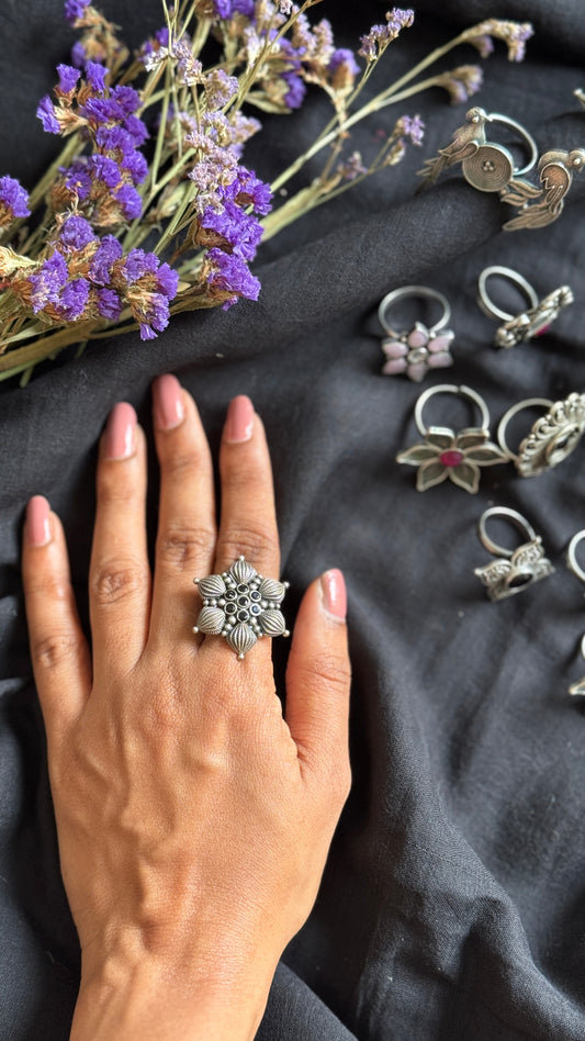 Adjustable floral petal ring - black stones