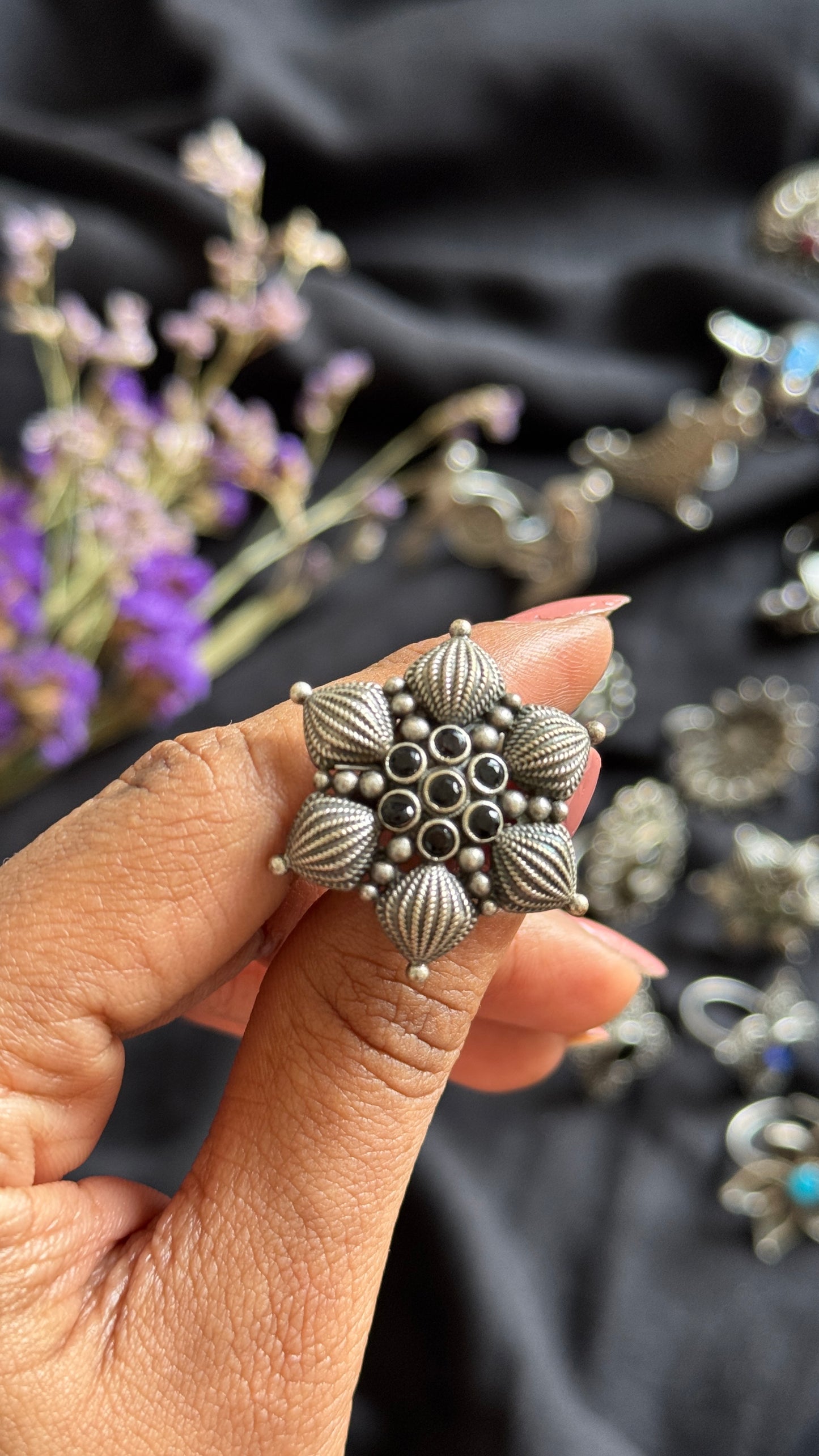 Adjustable floral petal ring - black stones