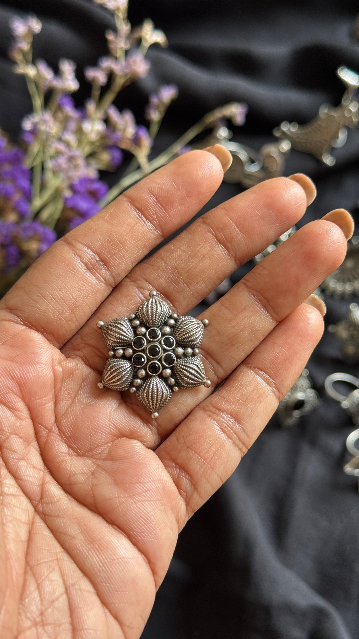 Adjustable floral petal ring - black stones
