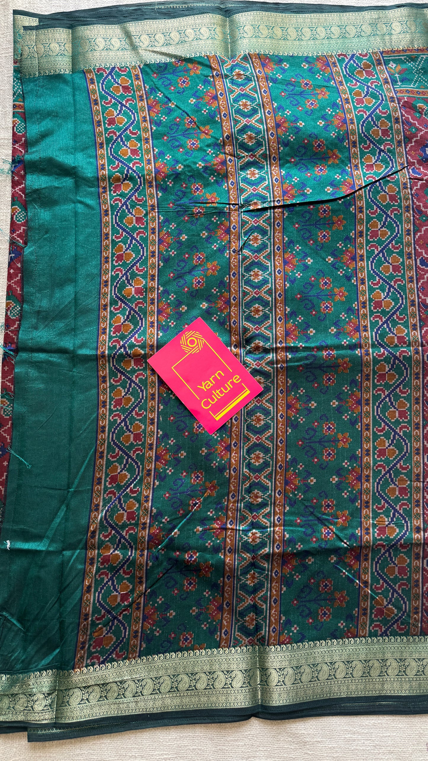 Maroon with green in patola pattern - dola silk