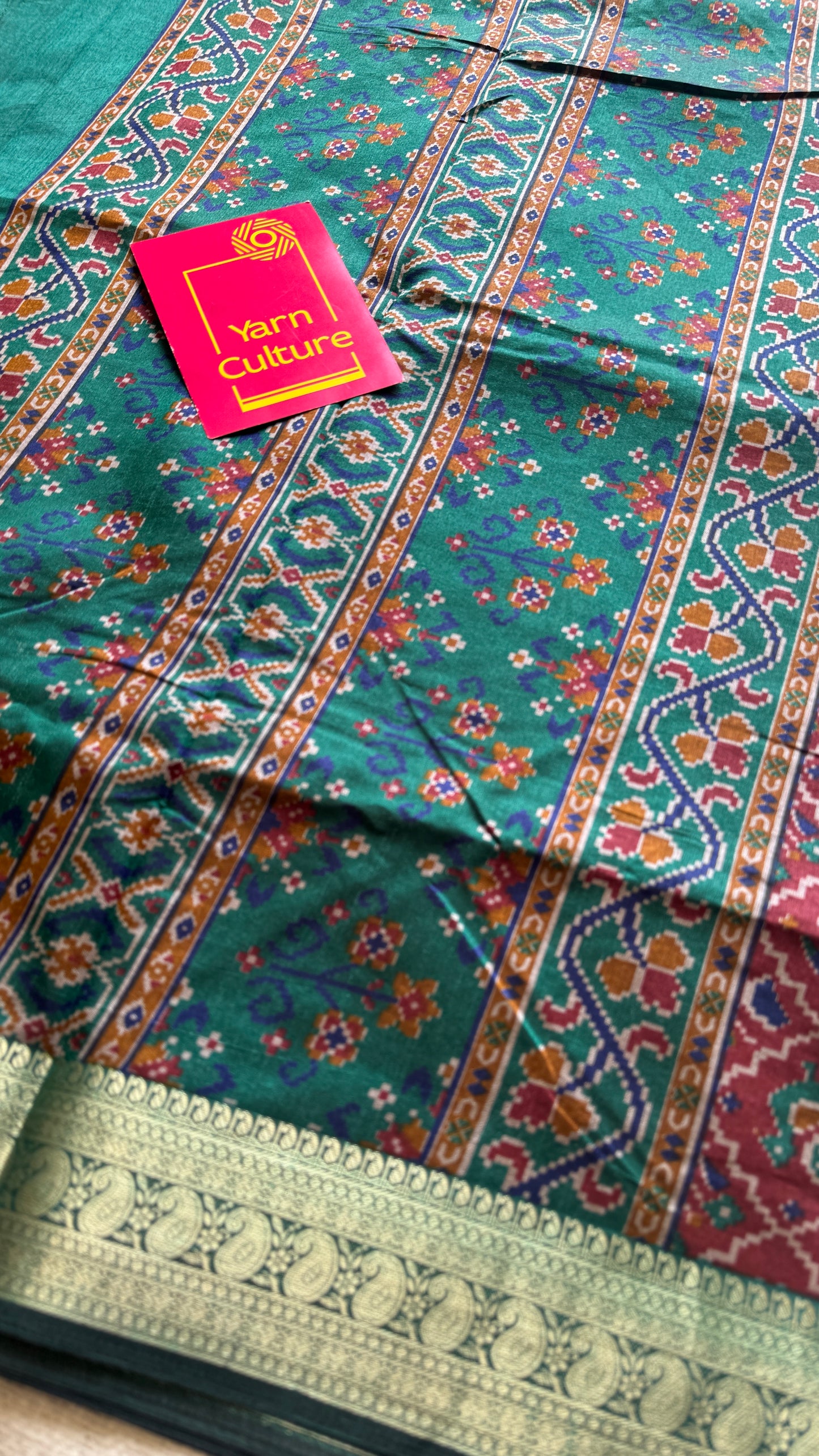 Maroon with green in patola pattern - dola silk