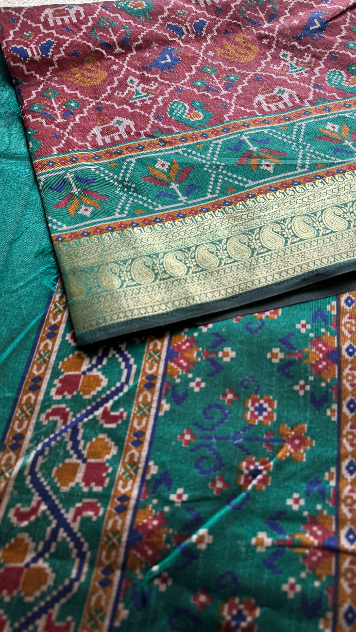 Maroon with green in patola pattern - dola silk