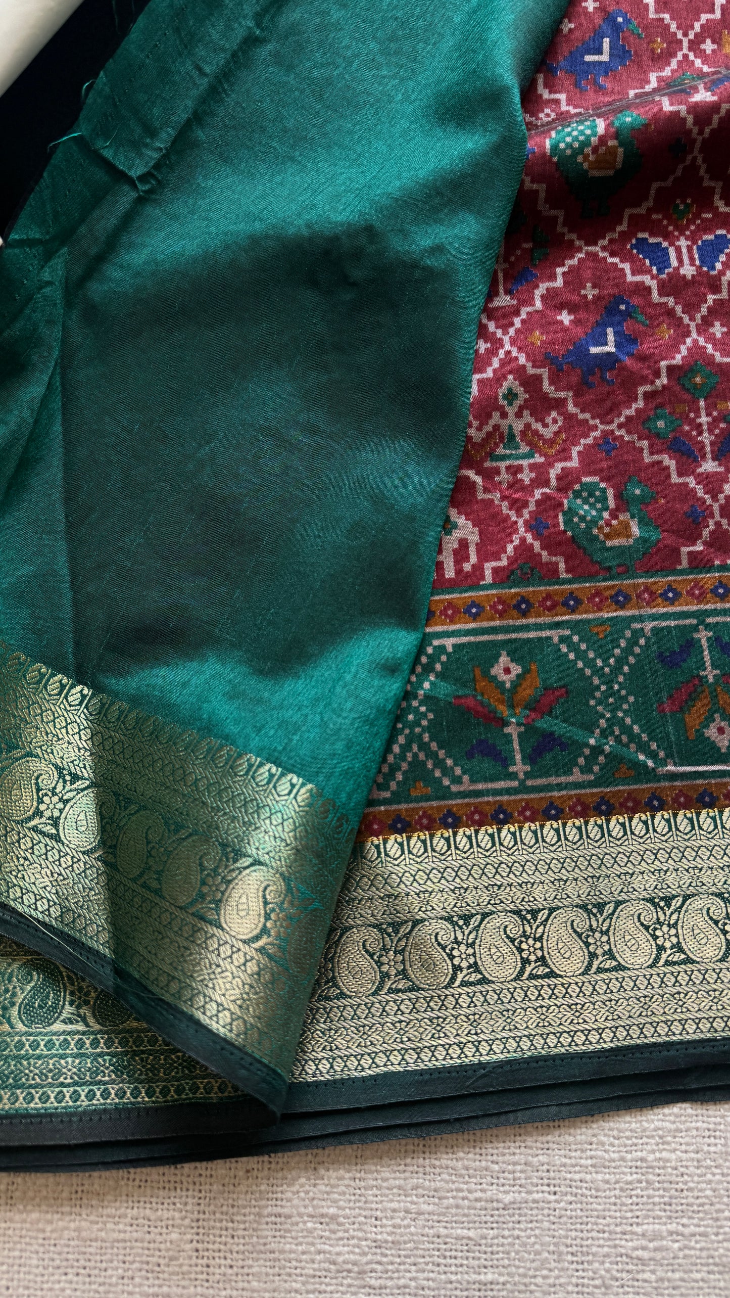 Maroon with green in patola pattern - dola silk