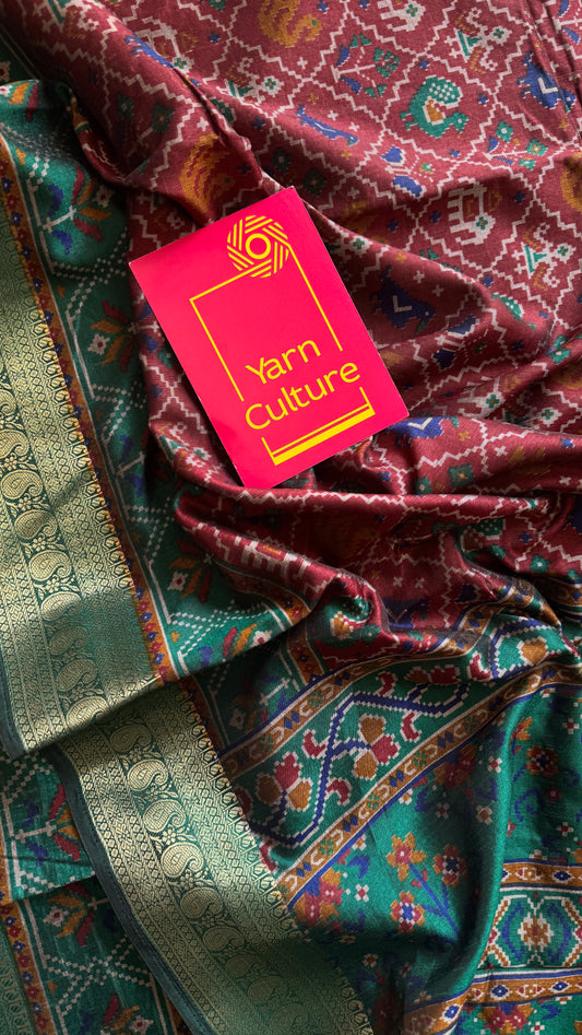 Maroon with green in patola pattern - dola silk