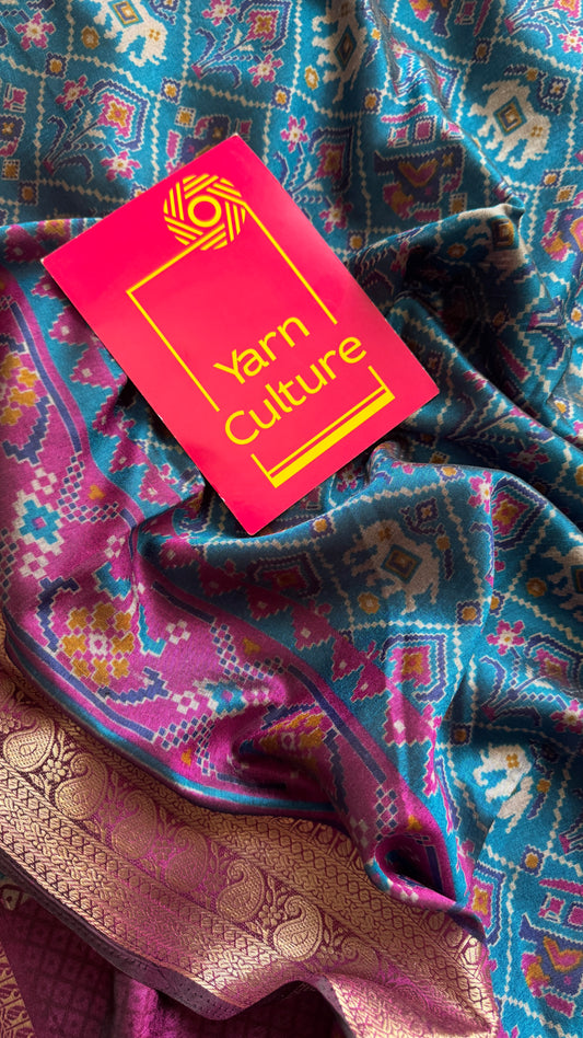 Peacock blue with wine in patola pattern - dola silk