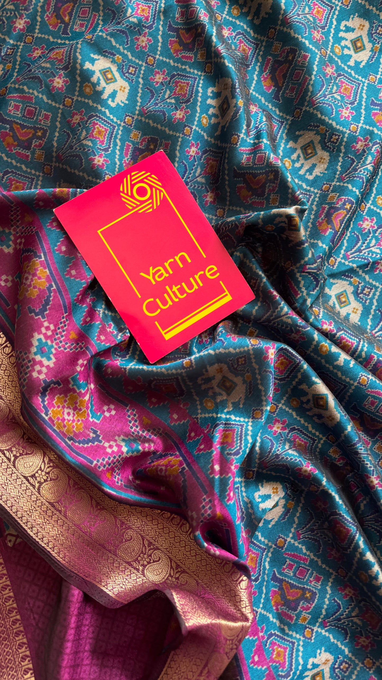 Peacock blue with wine in patola pattern - dola silk