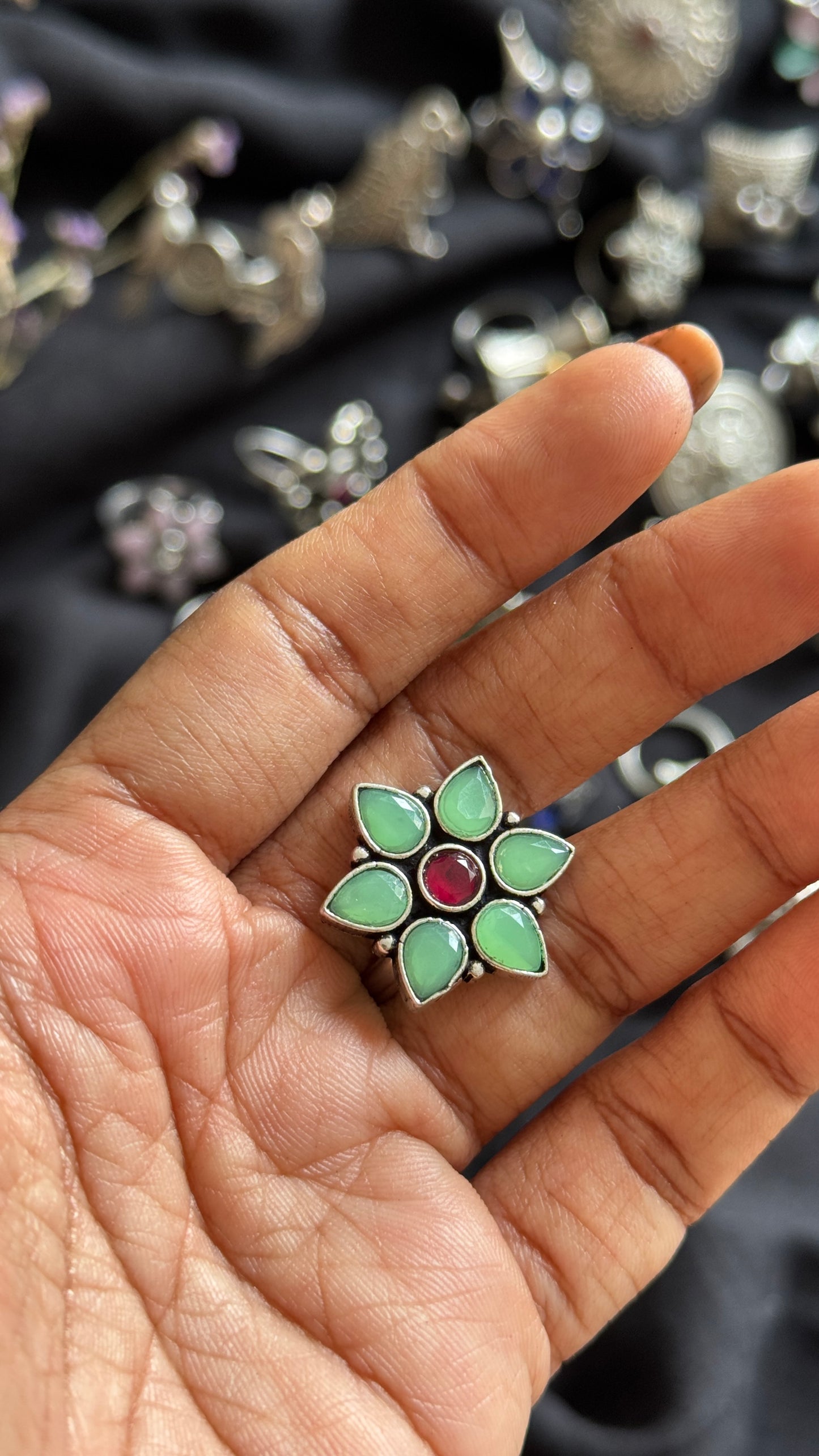 Adjustable floral ring - mint green & red stone