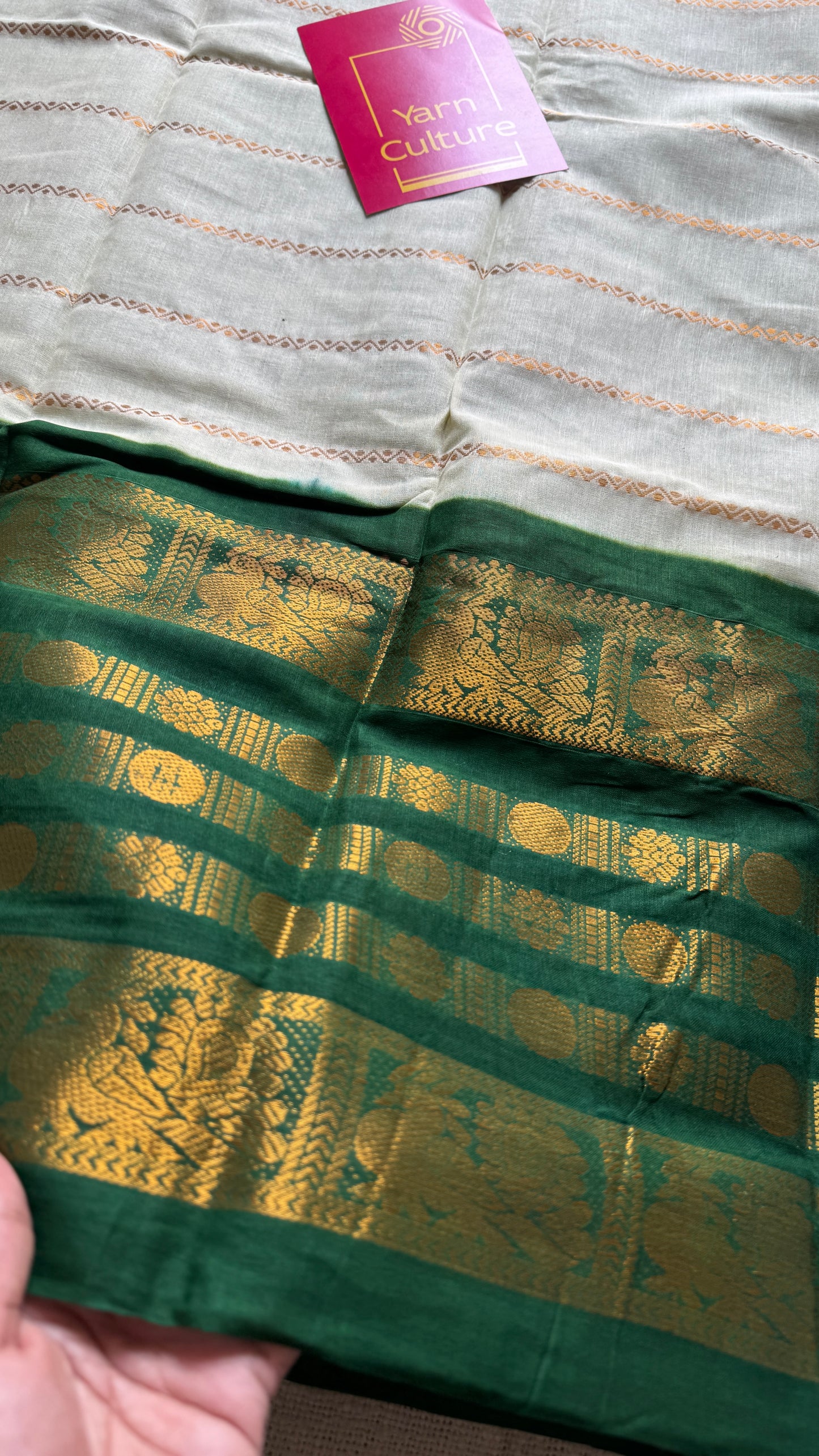 Offwhite and green sungudi with peacock motif rettai pettu wide border