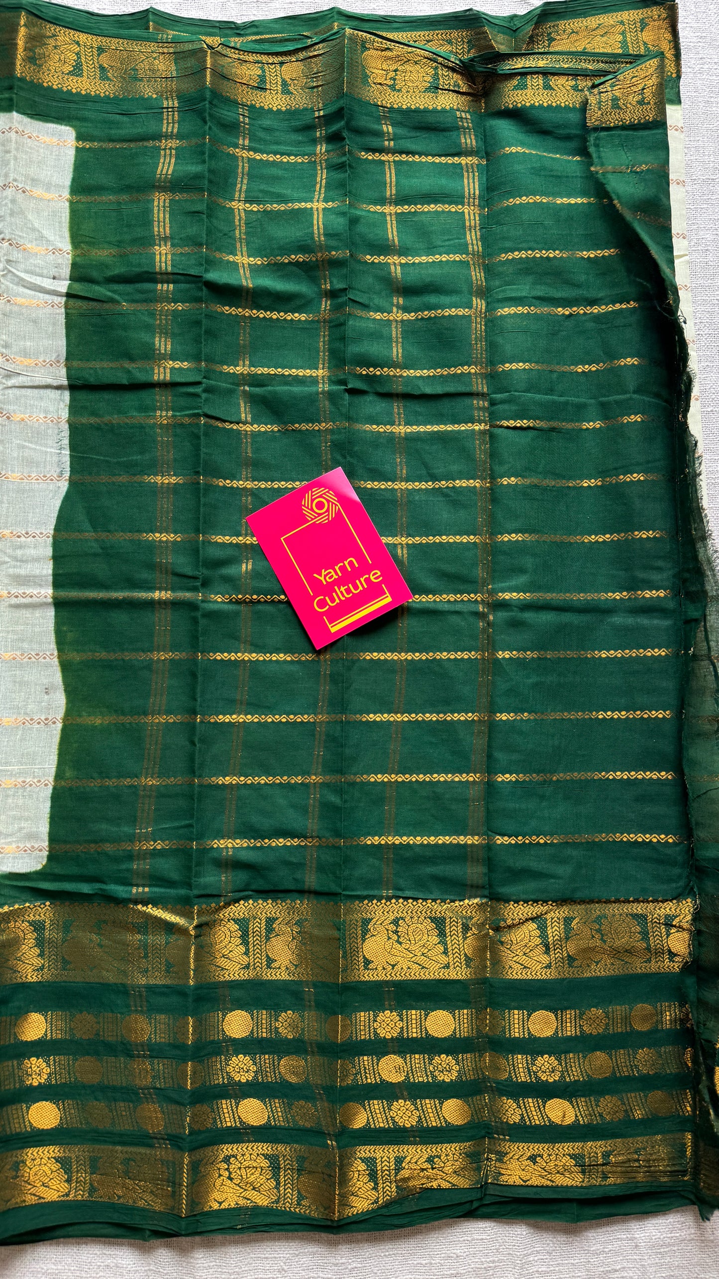 Offwhite and green sungudi with peacock motif rettai pettu wide border
