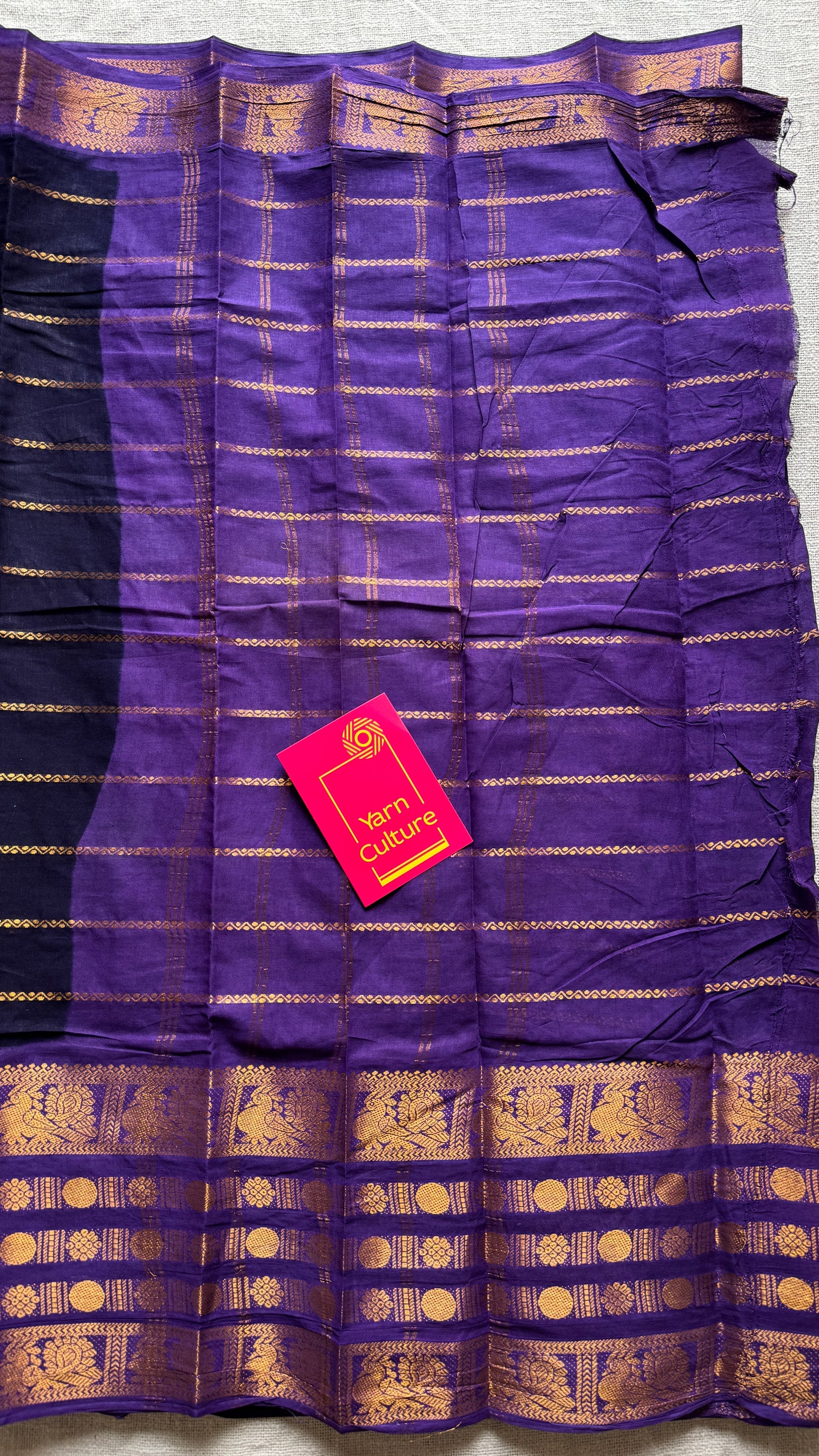 Black and violet sungudi with peacock motif rettai pettu wide border