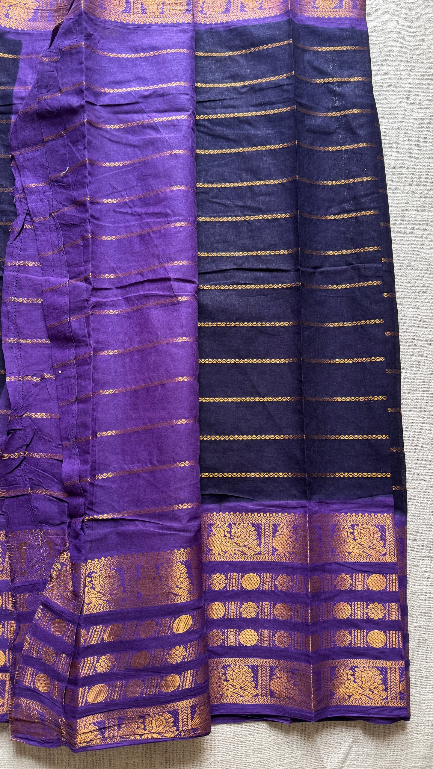 Black and violet sungudi with peacock motif rettai pettu wide border