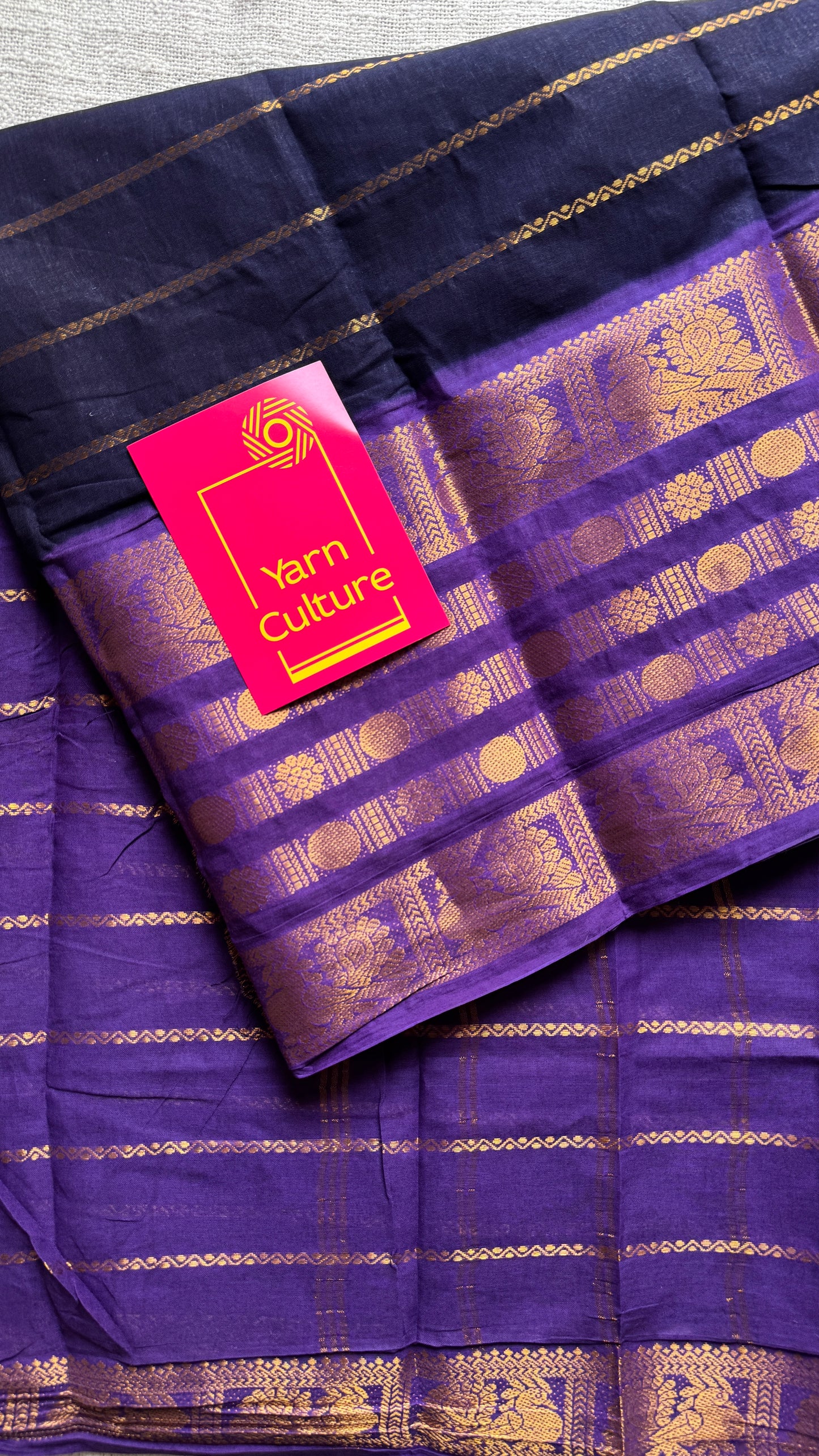 Black and violet sungudi with peacock motif rettai pettu wide border