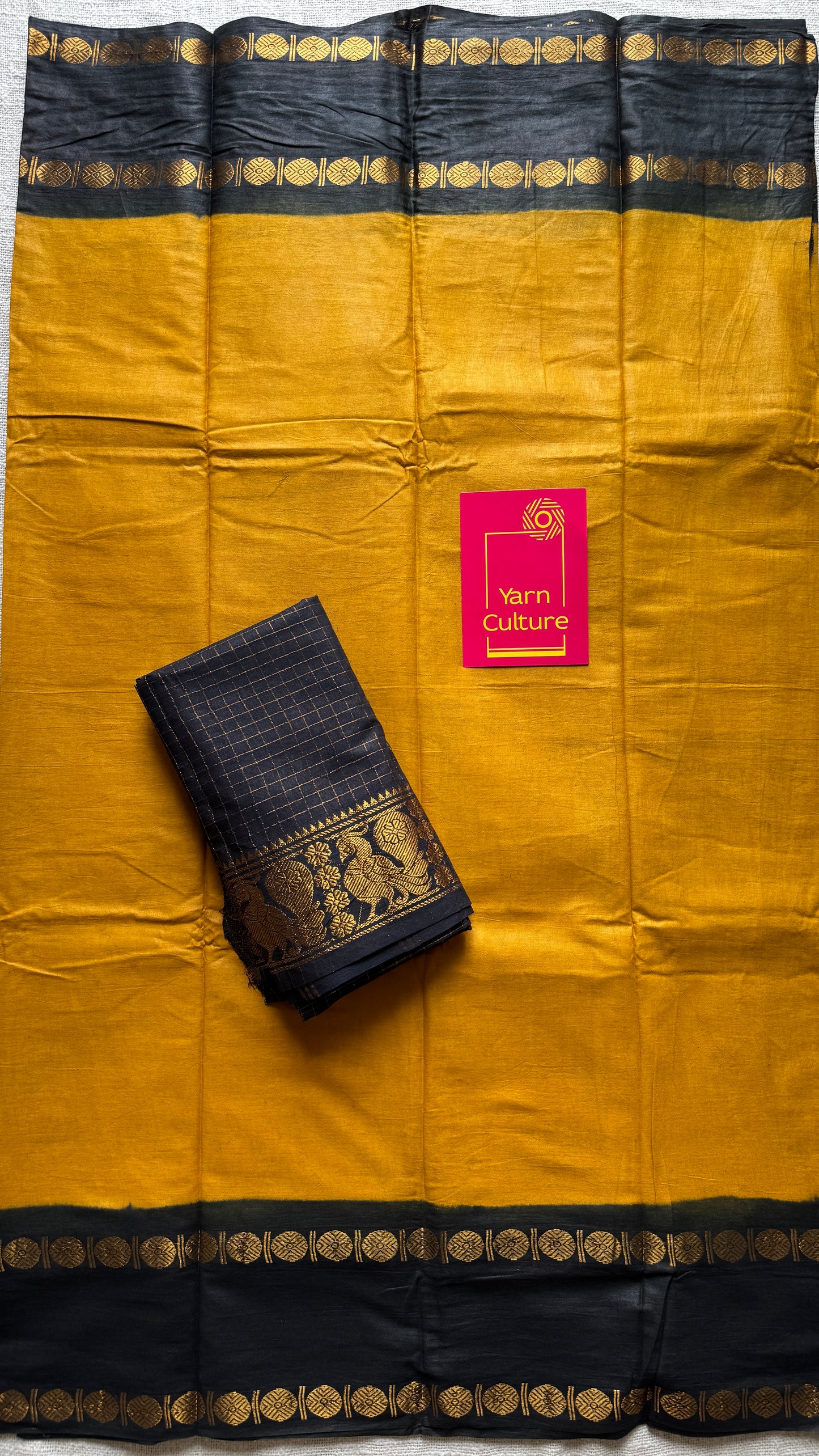Dark yellow with black rudraksham motif border