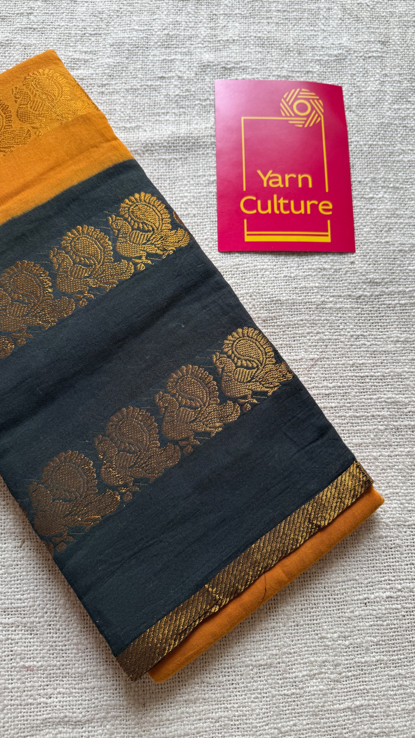 Dark Yellow and black sungudi with double peacock motif rettai pettu wide border