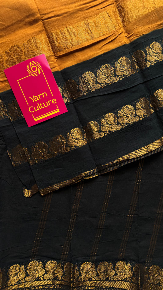 Dark Yellow and black sungudi with double peacock motif rettai pettu wide border