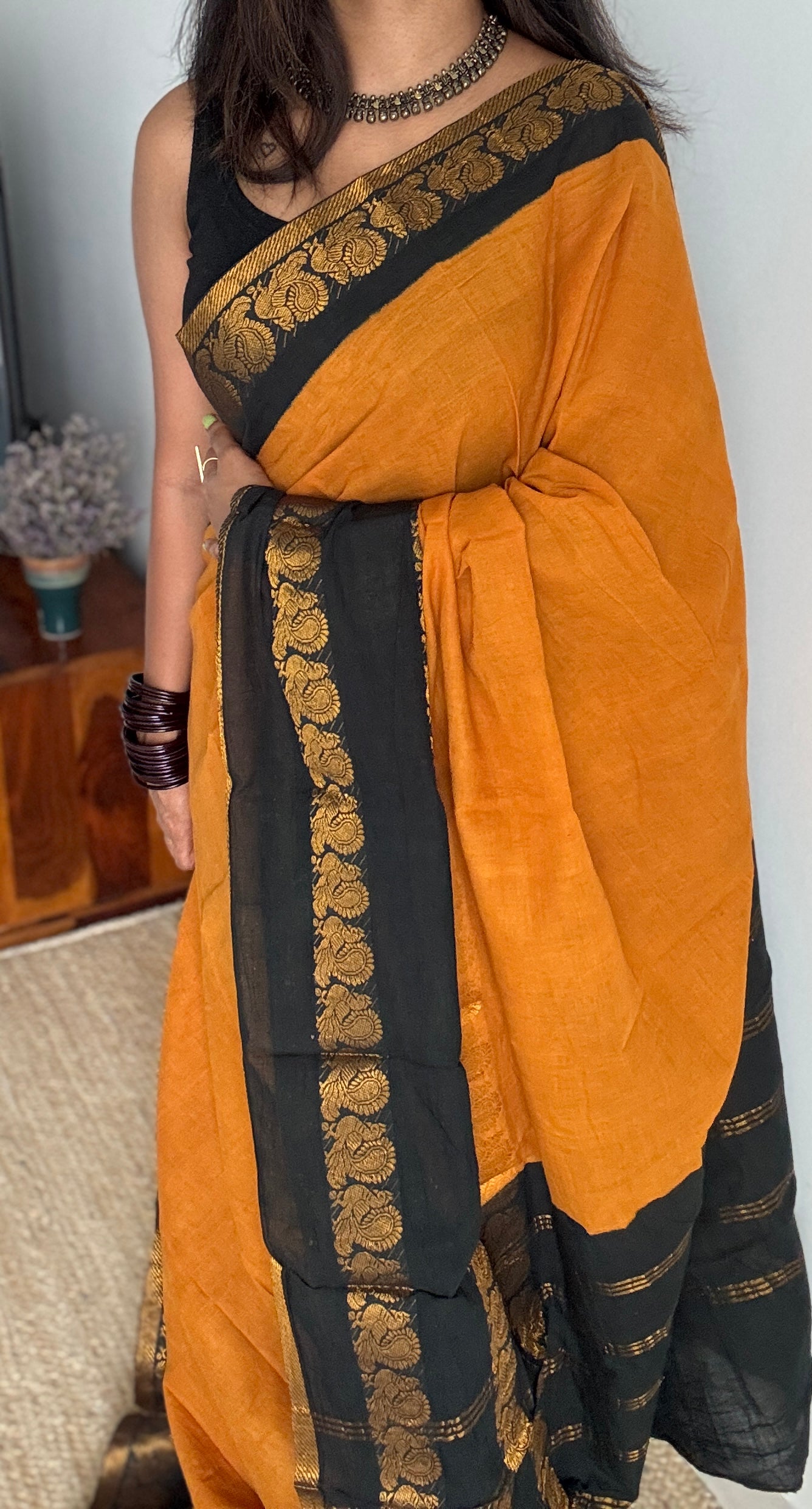 Dark Yellow and black sungudi with double peacock motif rettai pettu wide border