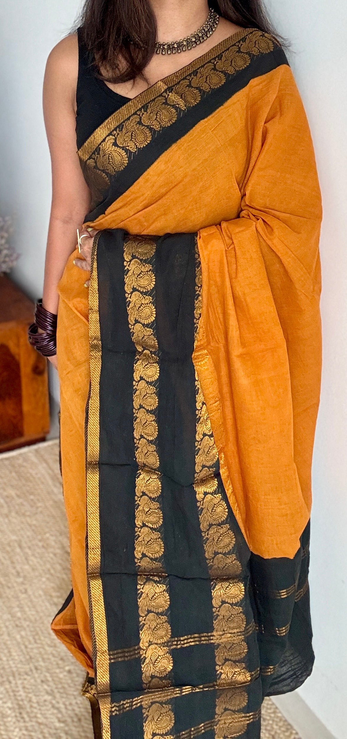 Dark Yellow and black sungudi with double peacock motif rettai pettu wide border