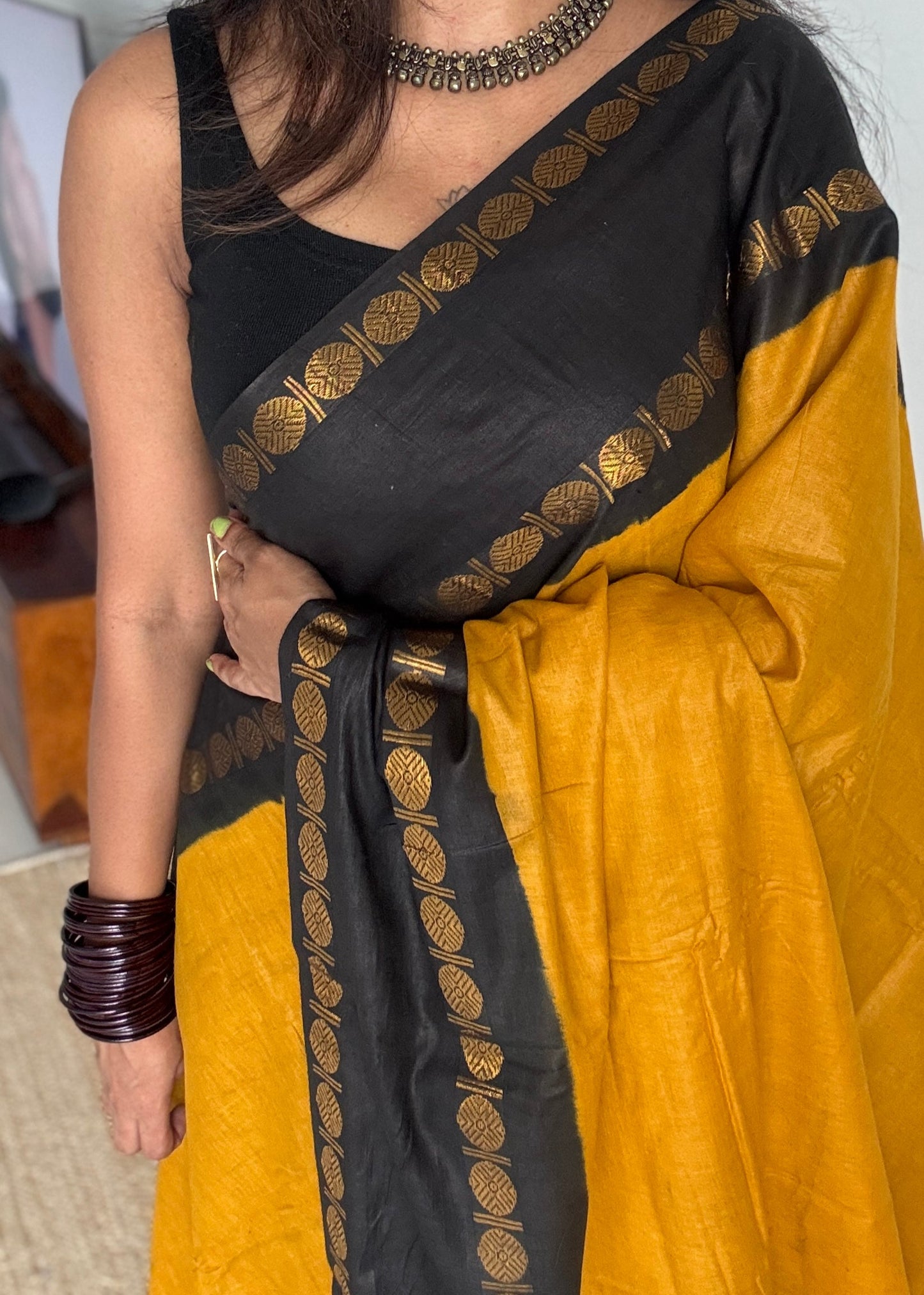 Dark yellow with black rudraksham motif border