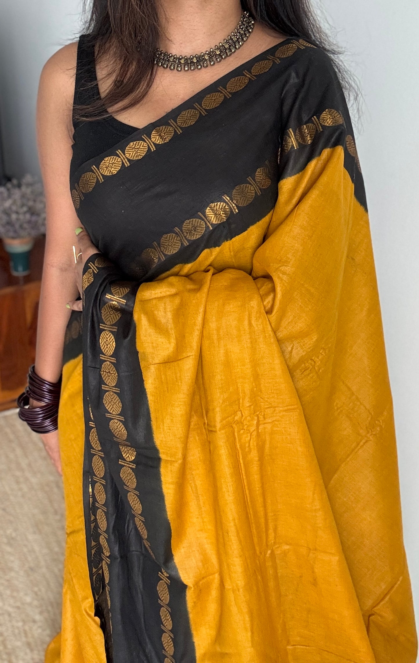 Dark yellow with black rudraksham motif border