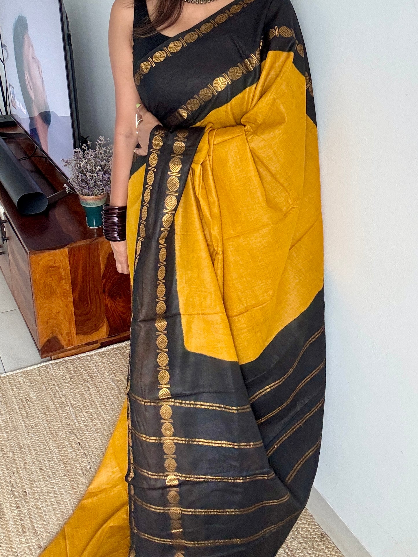 Dark yellow with black rudraksham motif border
