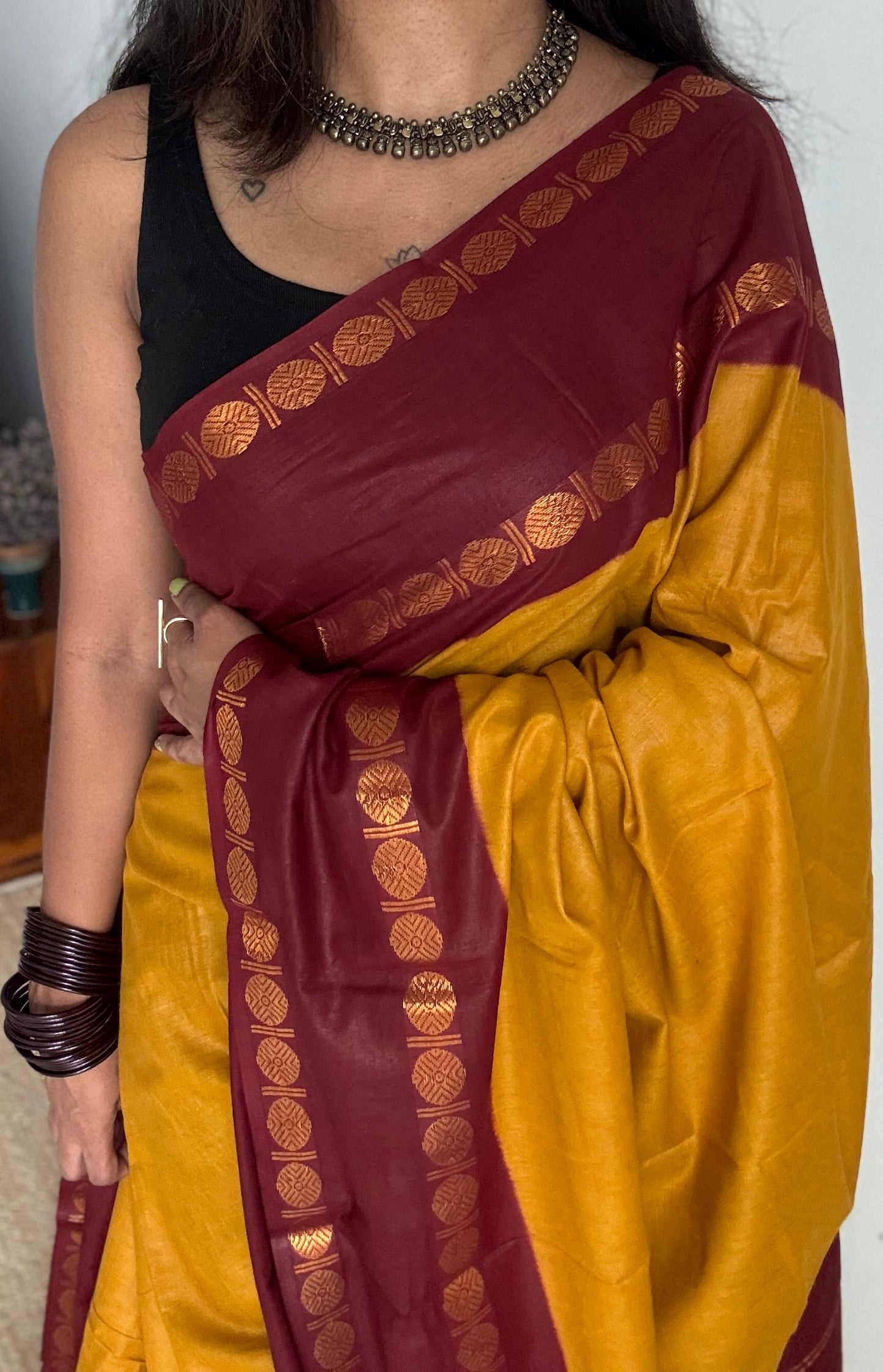 Dark yellow with maroon rudraksham motif border