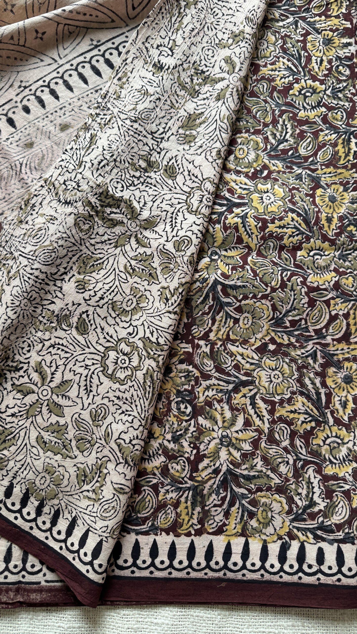 Maroon kalamkari, floral vines, floral motif pallu