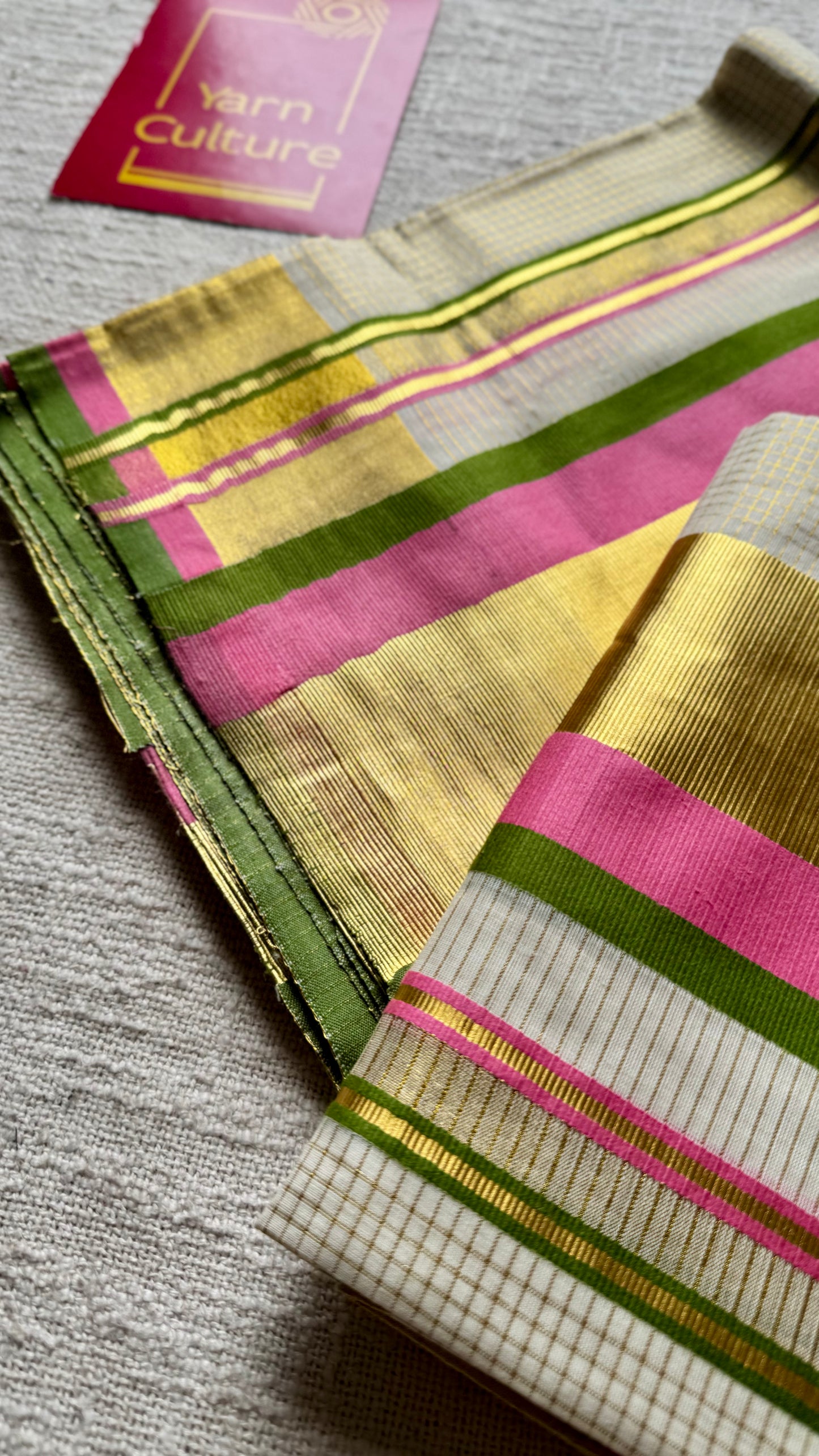 Set mund in checkered ivory and gold with pink and green kara (border), kerala tissue cotton- YCON25KCST17