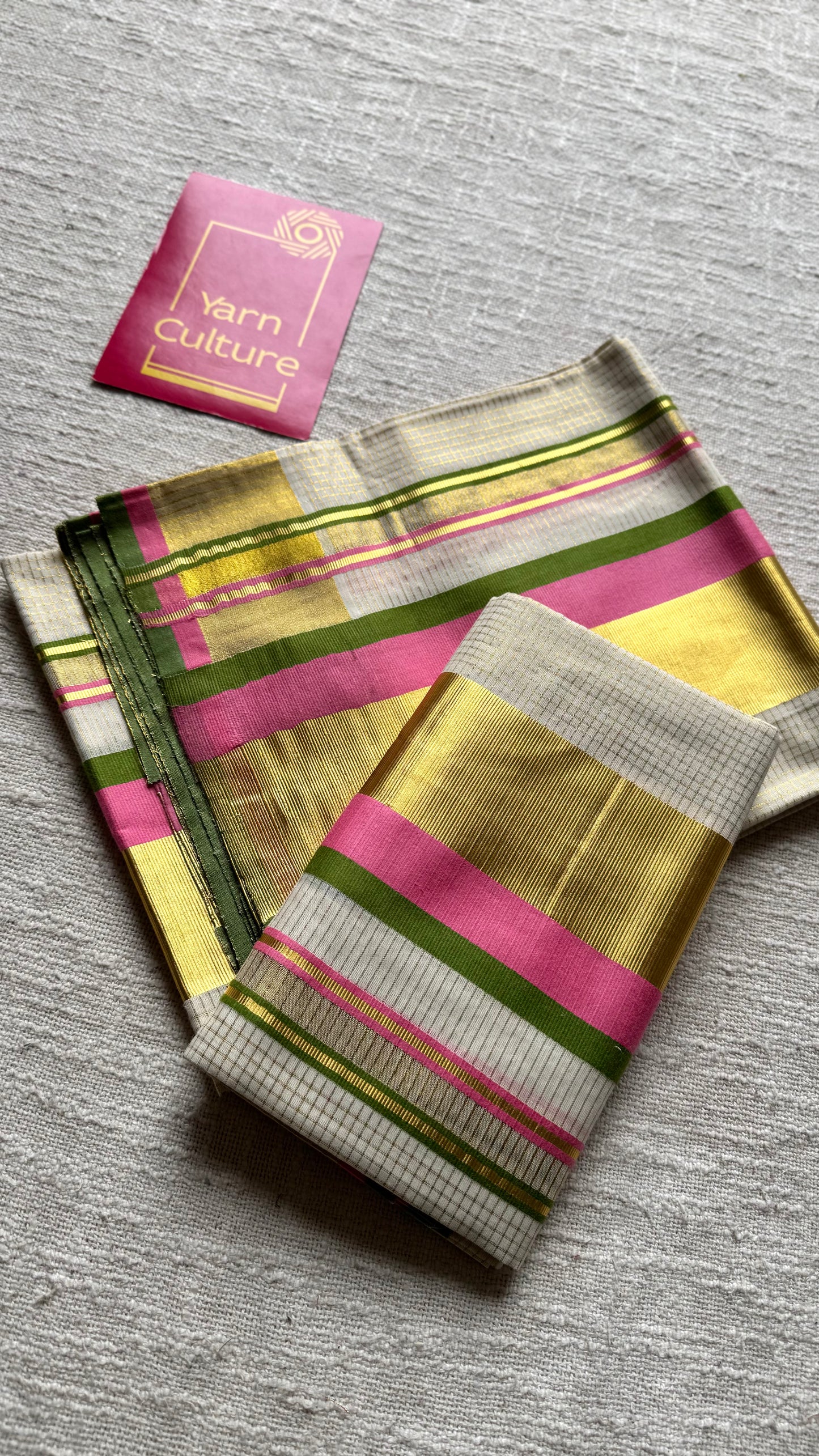 Set mund in checkered ivory and gold with pink and green kara (border), kerala tissue cotton- YCON25KCST17