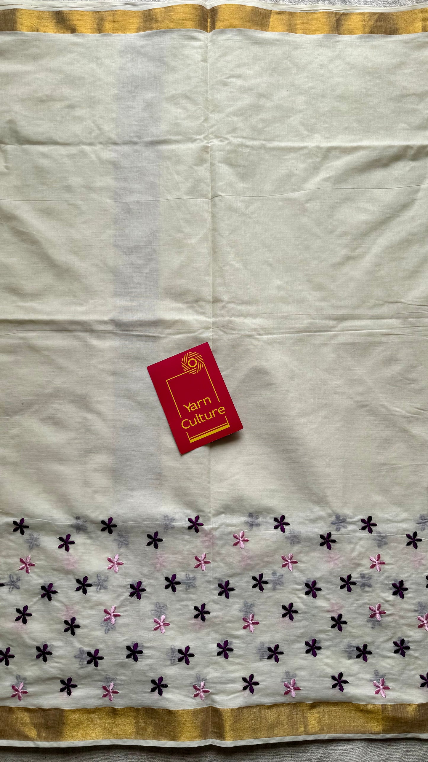 Anjana : Delicate purple and light pink flowers embroidered in soft Kerala cotton - YCONKCE156