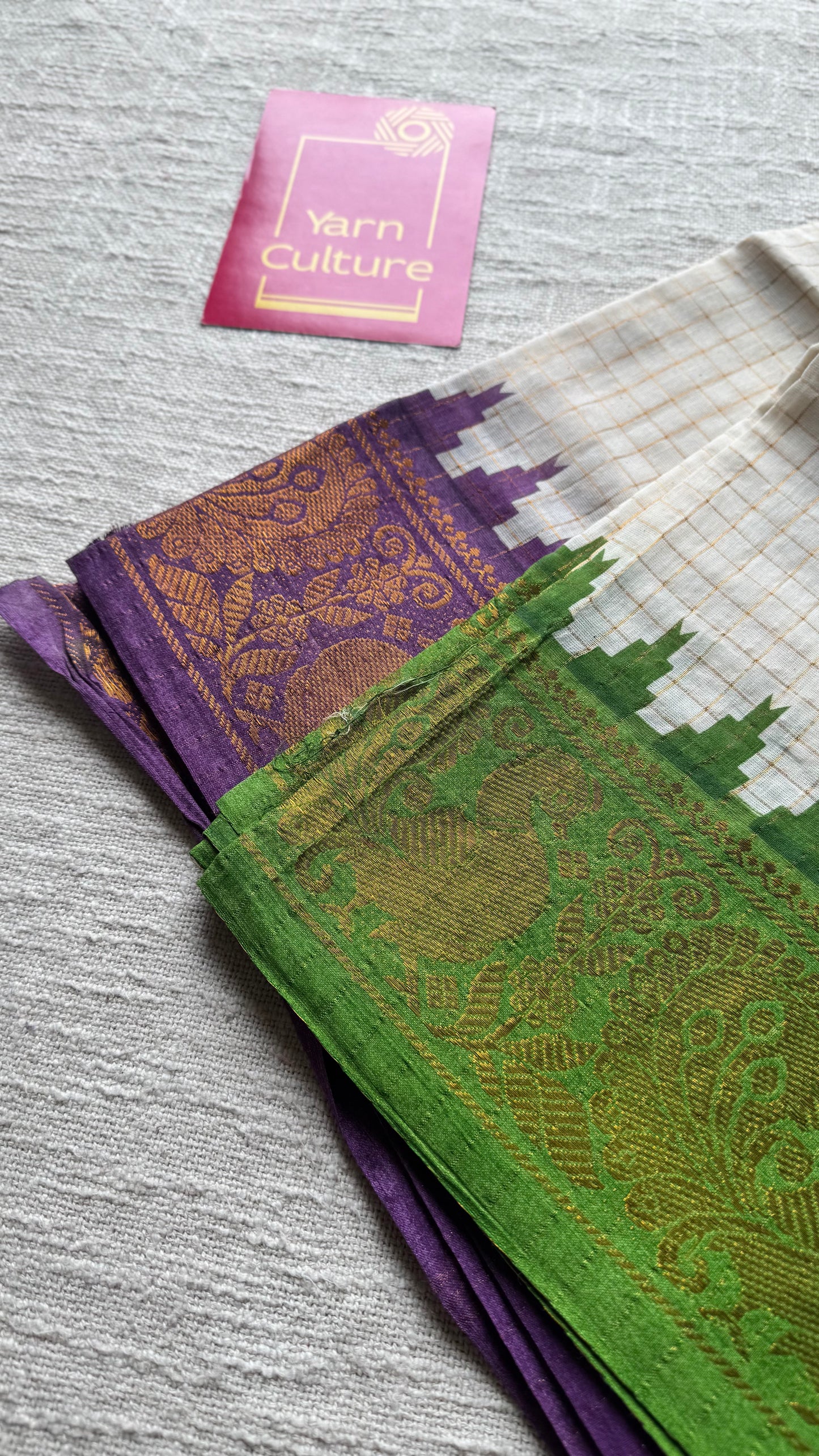 Apurva : Sungudi cotton checks, ivory gold base, green and purple dual tone border, soft cotton - YCONCOTN205