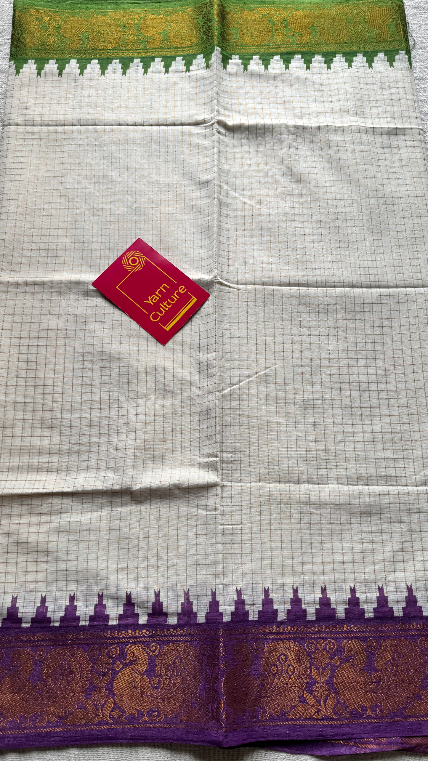 Apurva : Sungudi cotton checks, ivory gold base, green and purple dual tone border, soft cotton - YCONCOTN205