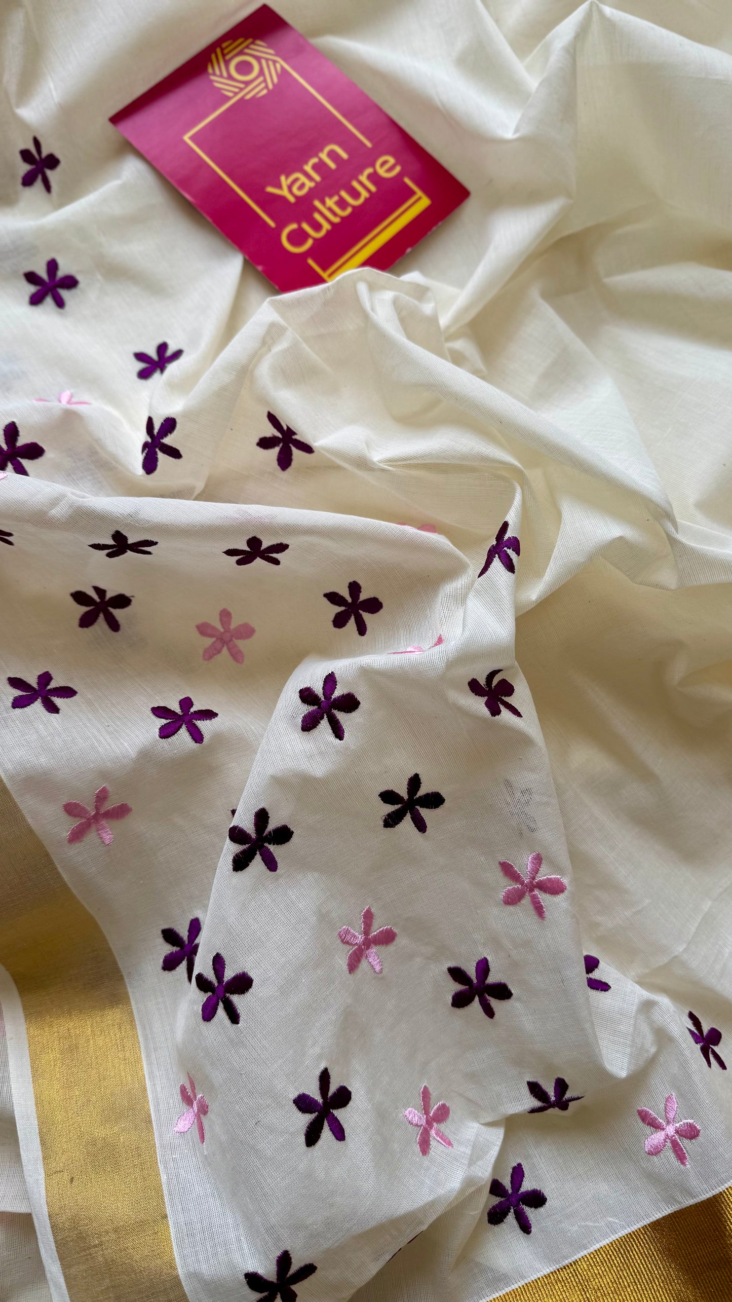 Anjana : Delicate purple and light pink flowers embroidered in soft Kerala cotton - YCONKCE156