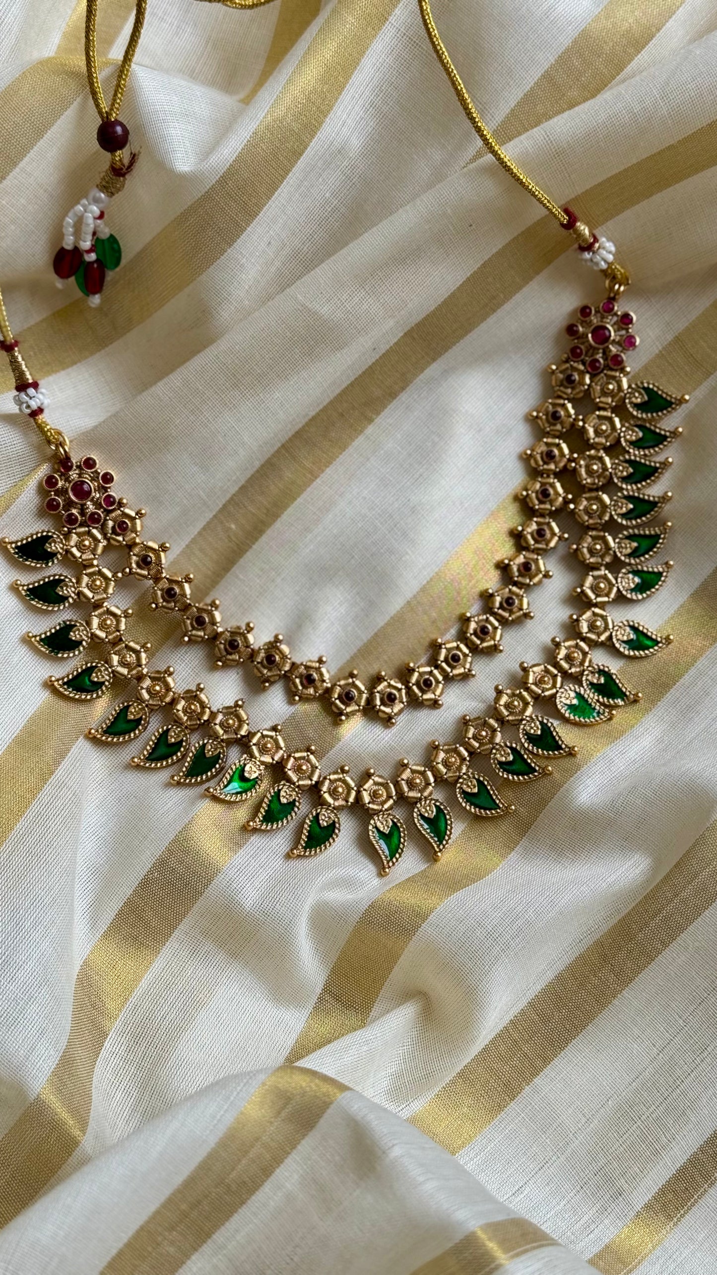 Green palakka double layered necklace in antique gold - YCAGC41