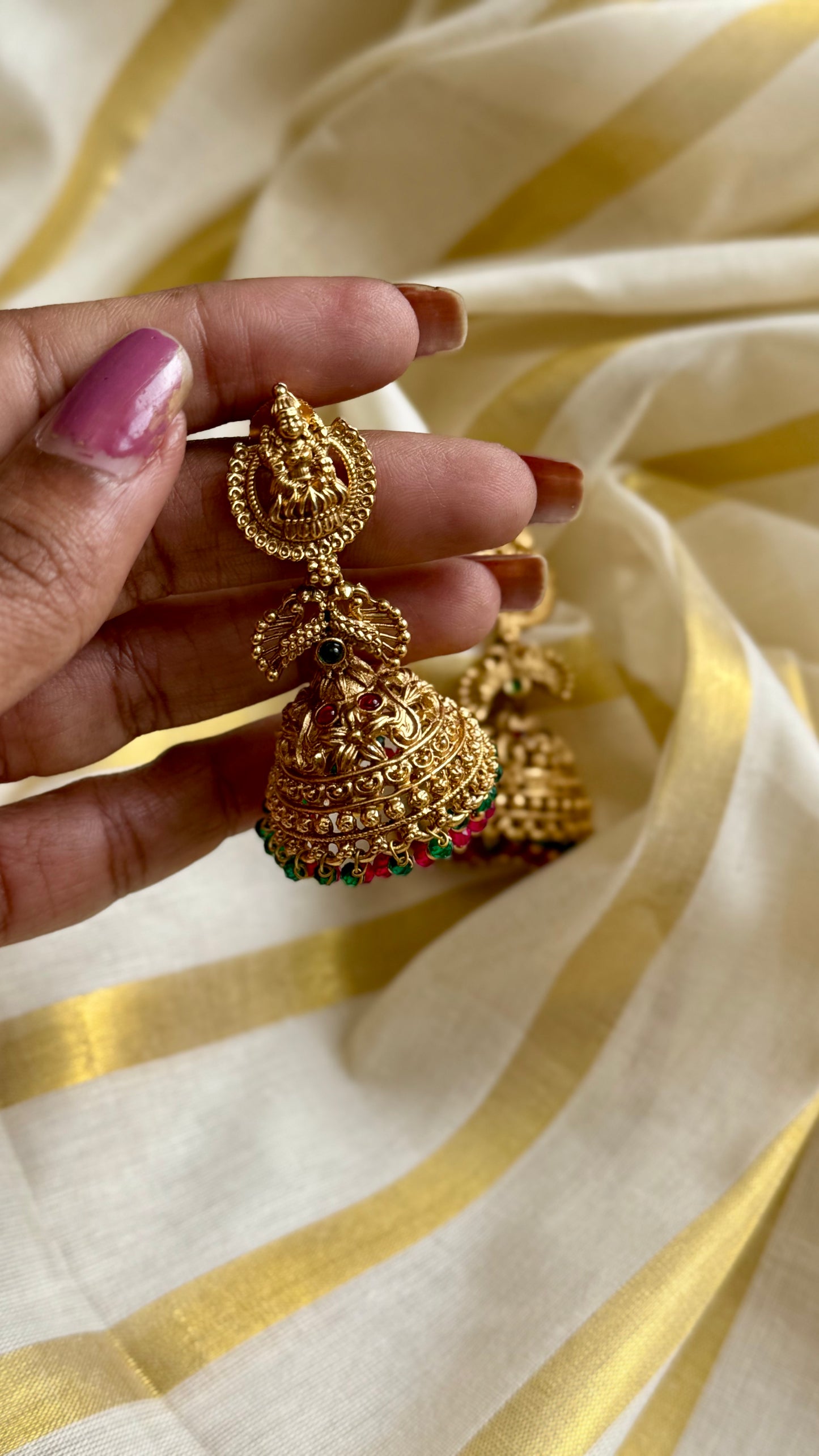 Jhumka with green and dark pink bead drops, gold finishing - YCAGJK87