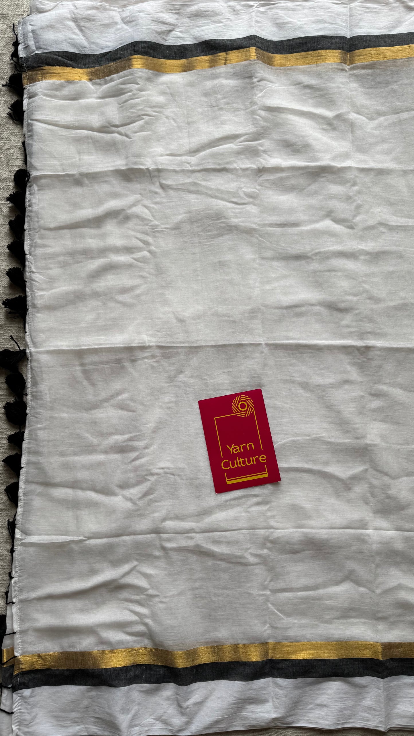 White with black and gold striped border, mul cotton - YCON25BCM40