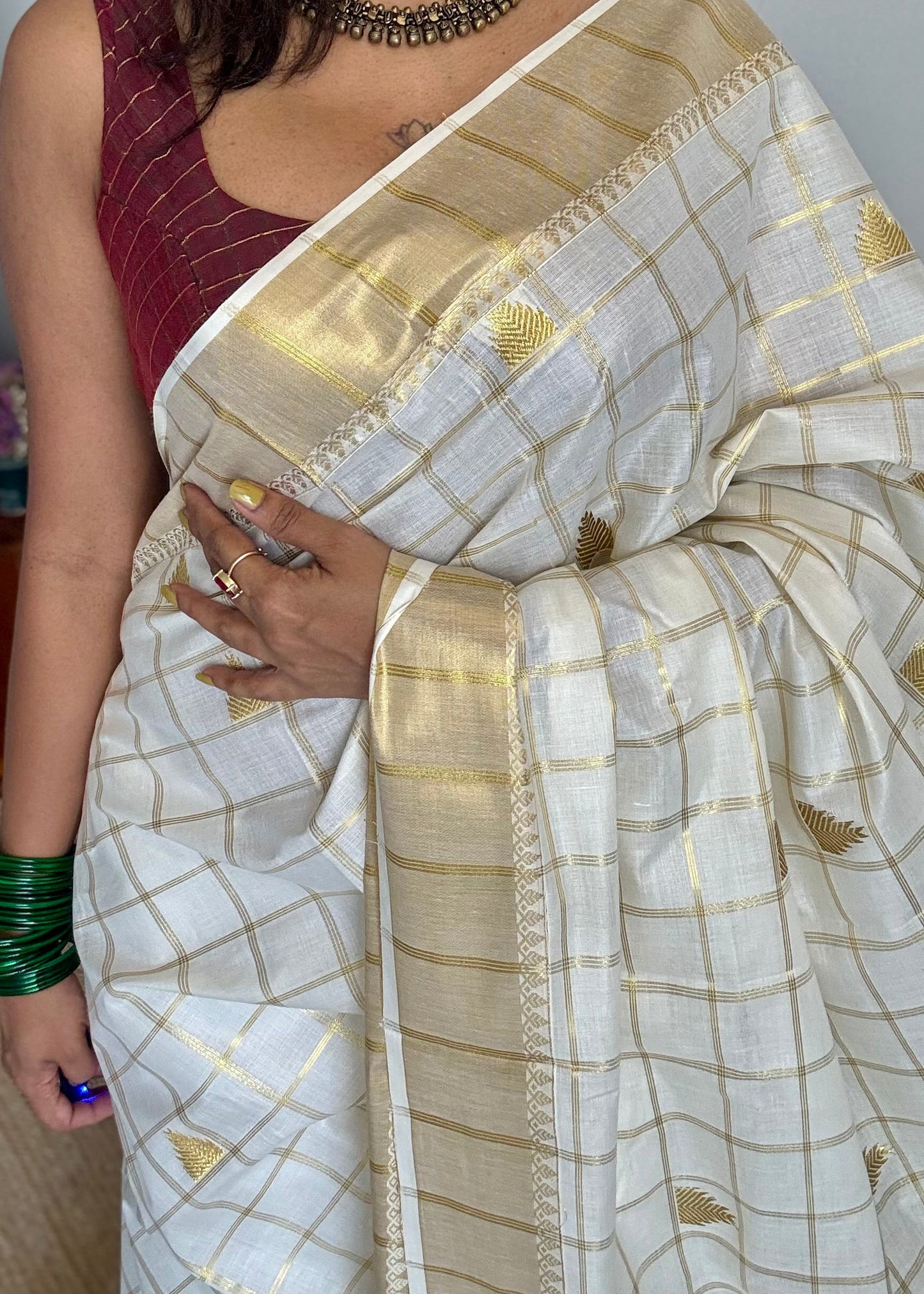 Ivory Kerala cotton saree with checks and gold jacquard motifs - YCIEKCFE319