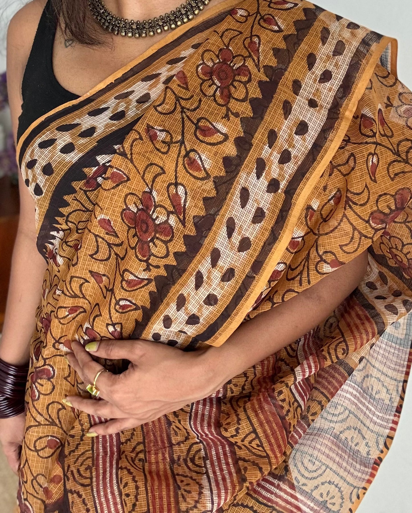 Orange Drama - light orange with brown floral kota doria saree - YCTORKDAP03