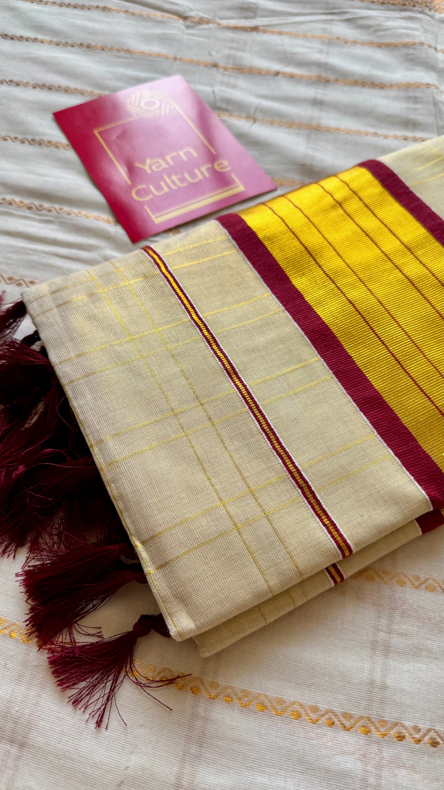 Ivory and gold kerala kasavu saree, maroon lotus motif border - YCIEON48
