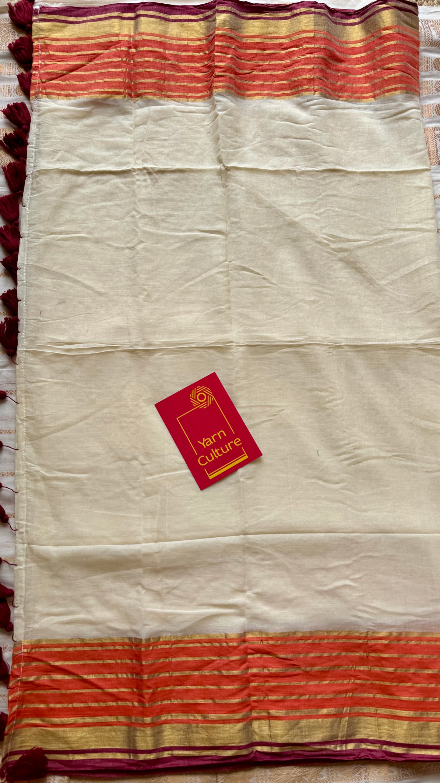 Ivory mul saree, orange with maroon striped border - YCIEON13