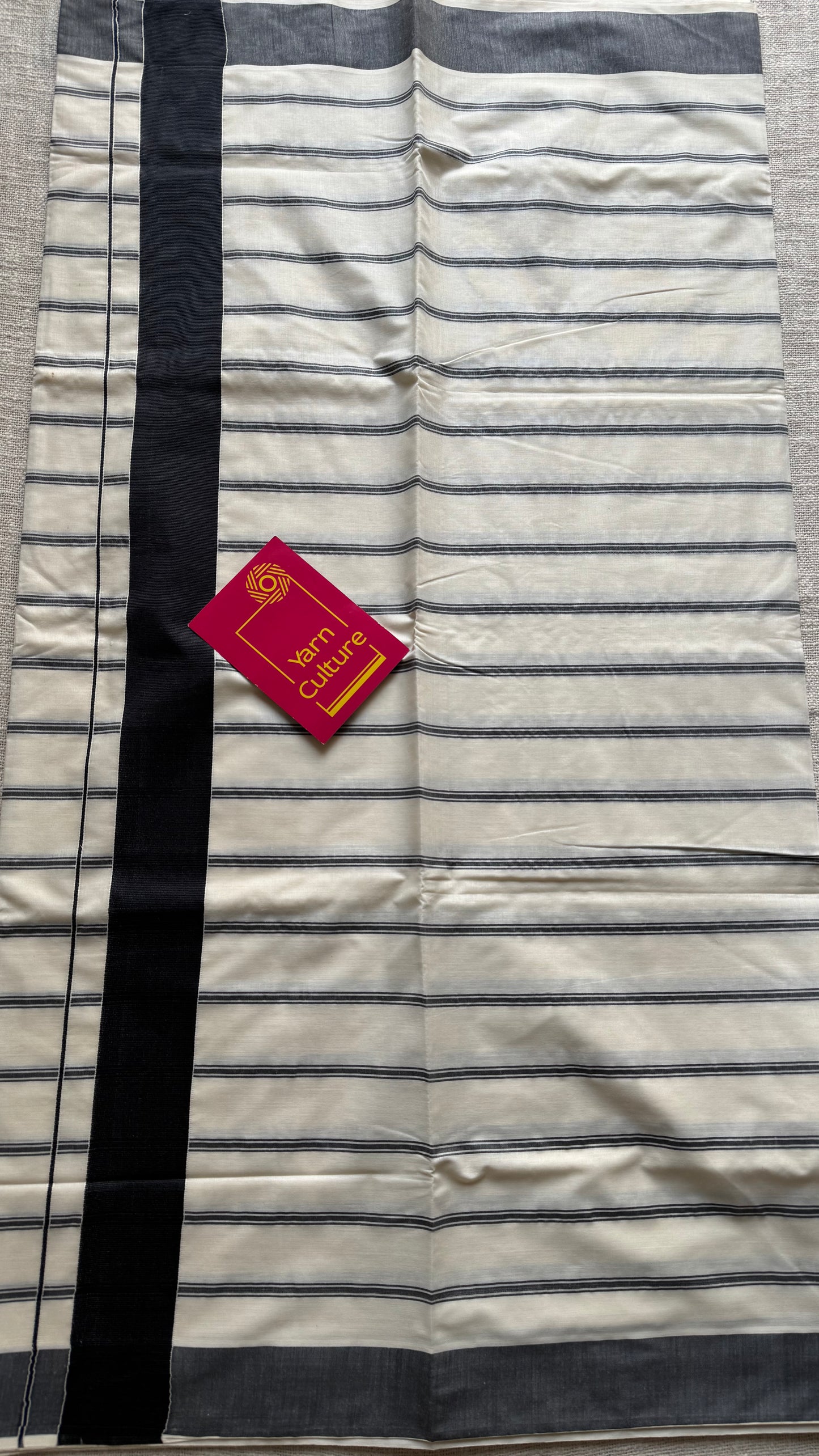 Ivory Kerala cotton saree with black stripes and border - YCIEKCFE321