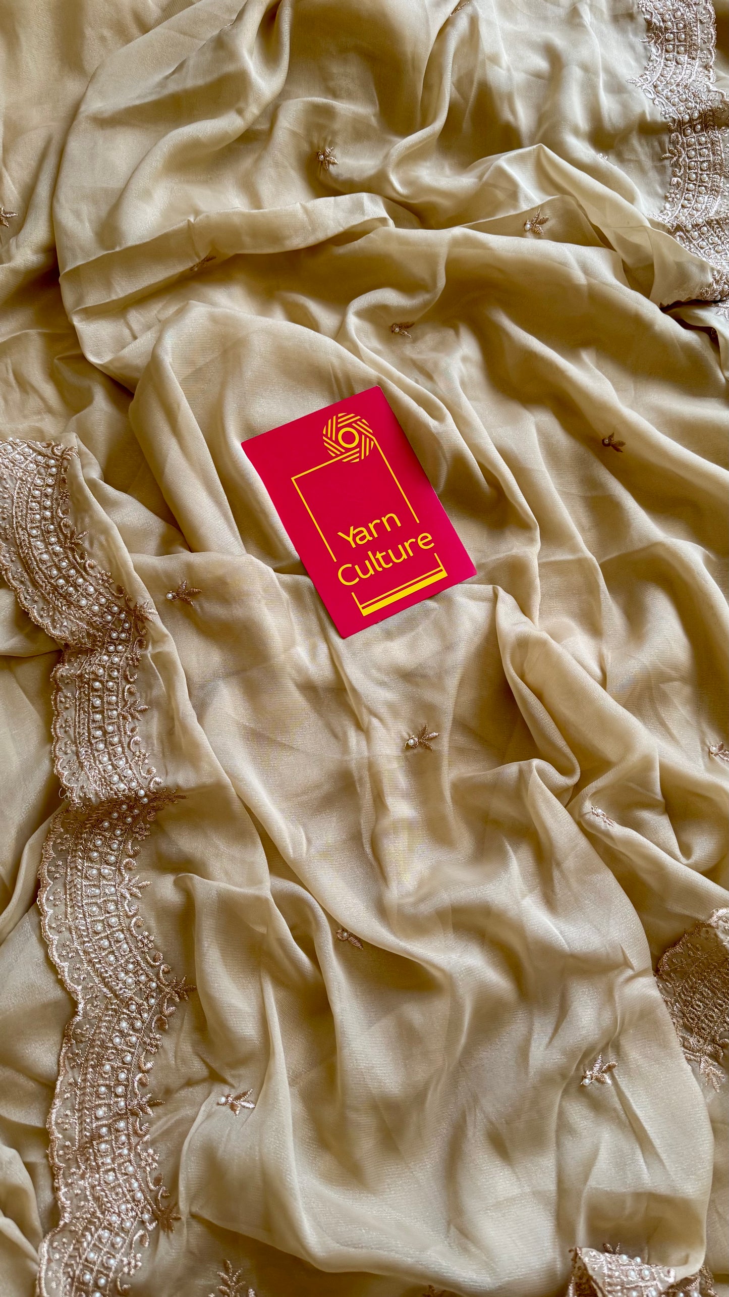 Gold soft chiffon saree, with pearl embellished border - YCIEON85