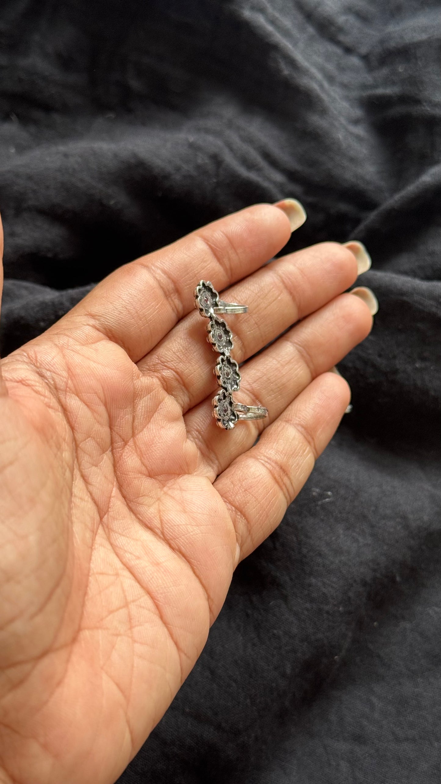 Oxidised silver, ruby stone floral patterned earcuff - YCOSEC710