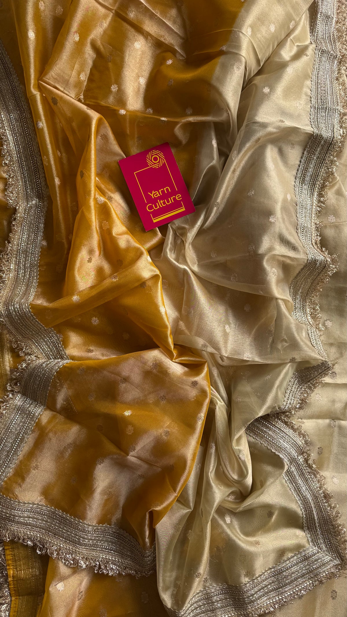 Light gold and dark gold Banarasi tissue saree, with buttas and embellished lace border - YCBLTOC65