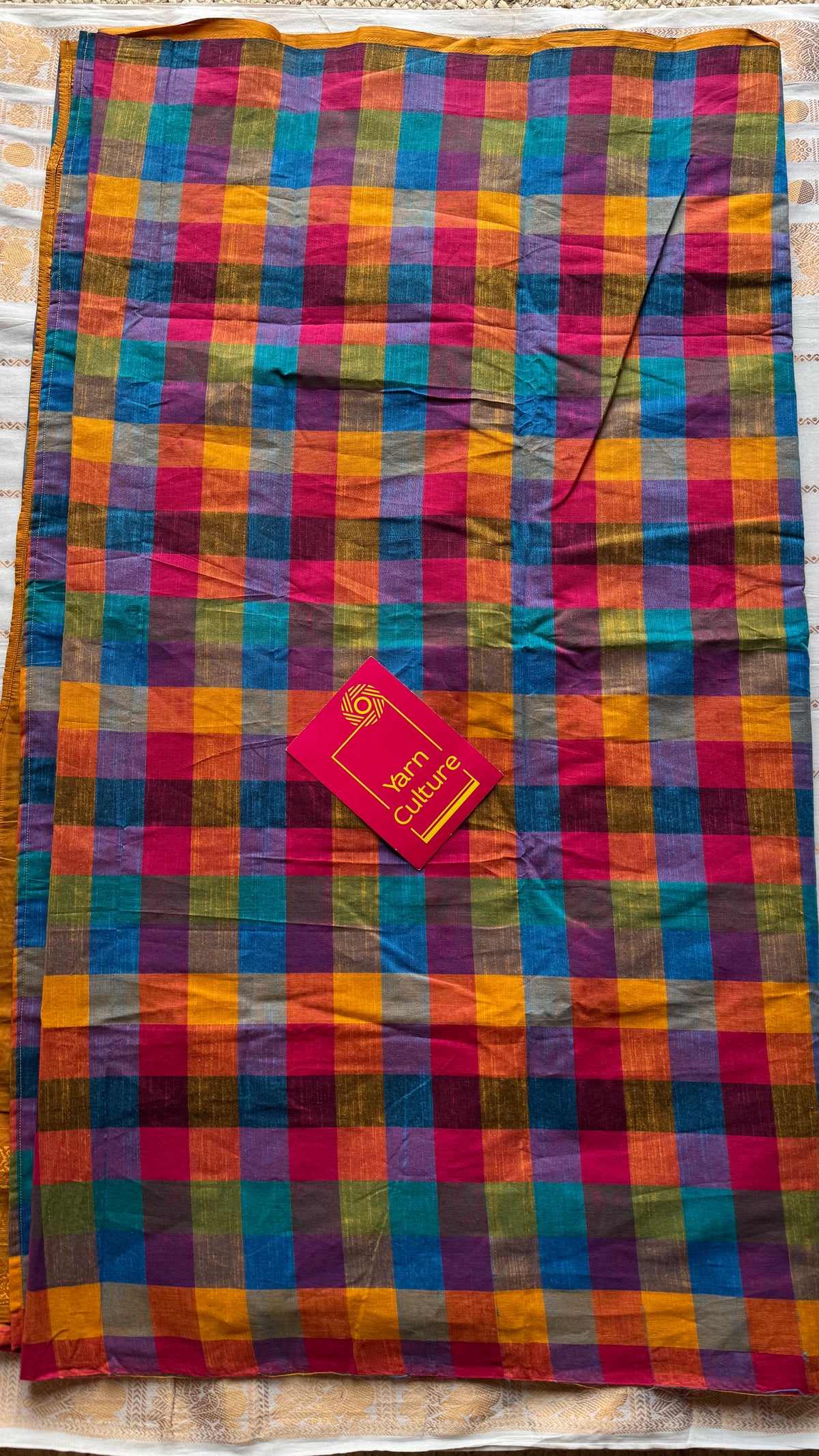 Turmeric yellow with multicoloured madras checks, cotton half and half saree - YCCOTNIDOC161
