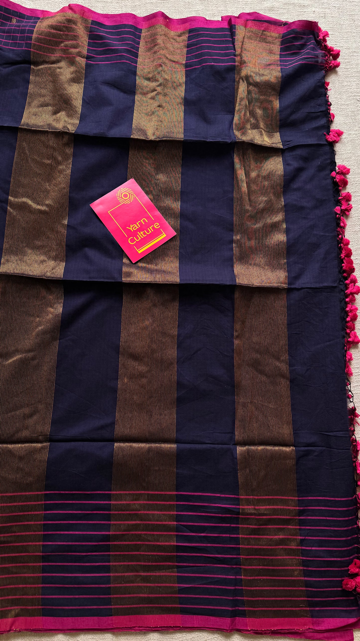 Navy handloom mul saree with hot pink checkered borders and antique gold buttas - YCBCMCFE386